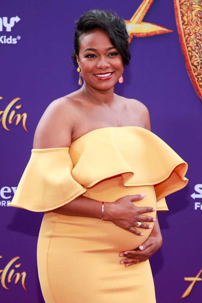 A pregnant Tatyana Ali attending the premiere of Disney's "Aladdin" in May 2019. | Photo: Getty Images
