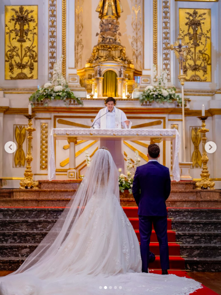 Rute Cardoso and Diogo Jota standing before a priest. | Source: Instagram/rutecfcardoso14