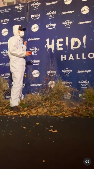 One of the people in the disposable overalls apart of Heidi Klum's elaborate Halloween party set-up, posted on November 1, 2024 | Source: Instagram/heidiklum