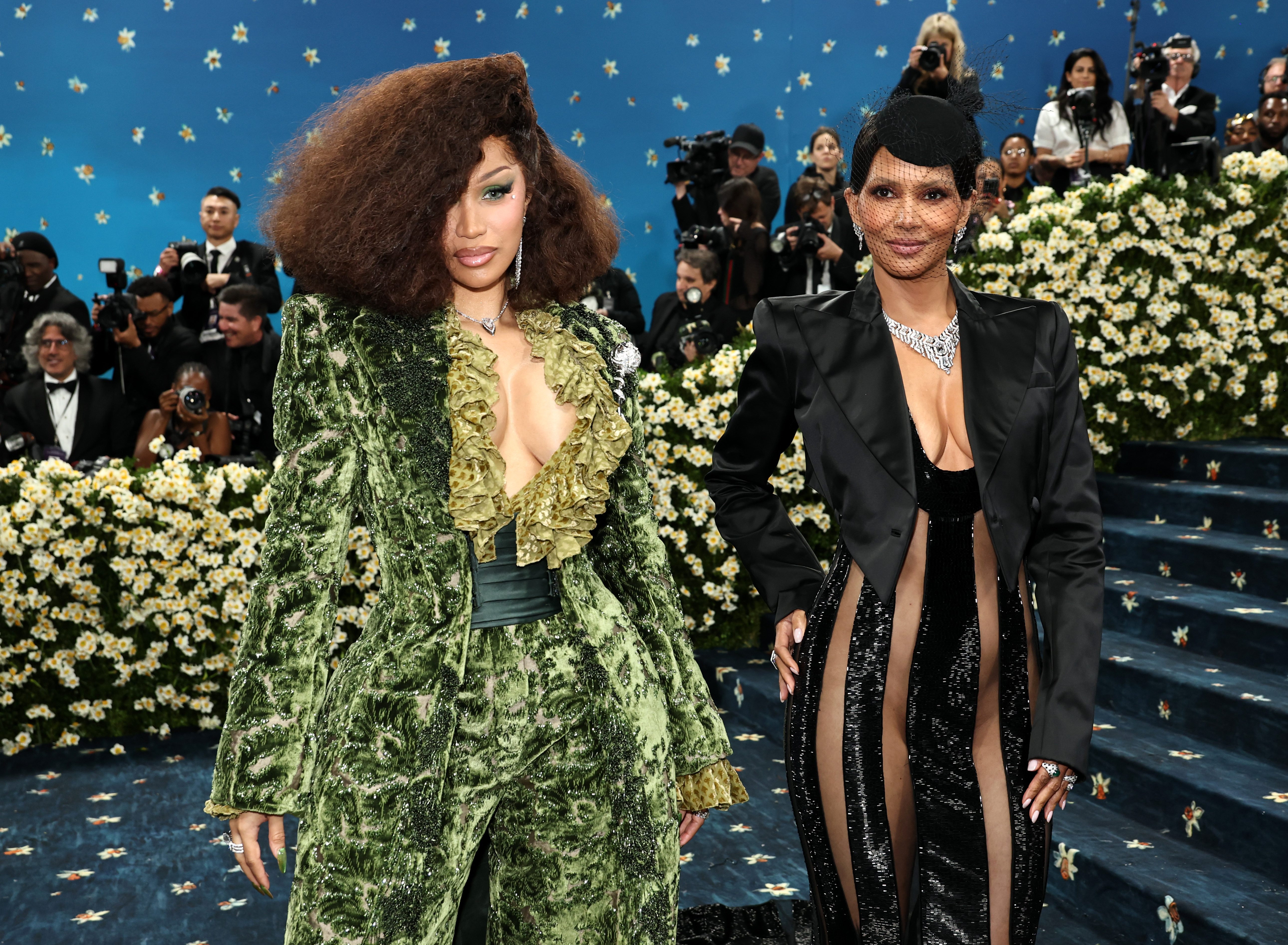 Cardi B and Halle Berry are seen at The Metropolitan Museum of Art on May 5, 2025, in New York City | Source: Getty Images