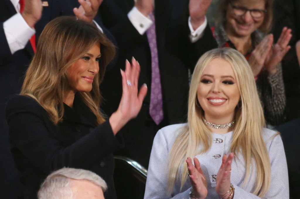 First Lady Melania Trump waves from the First Lady's box as Tiffany Trump looks on during the State of the Union address in the chamber of the U.S. House of Representatives on February 04, 2020 in Washington, DC. | Photo: Getty Images