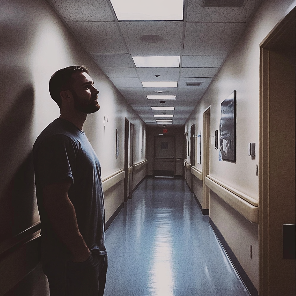 A man standing in a hospital hallway | Source: Midjourney