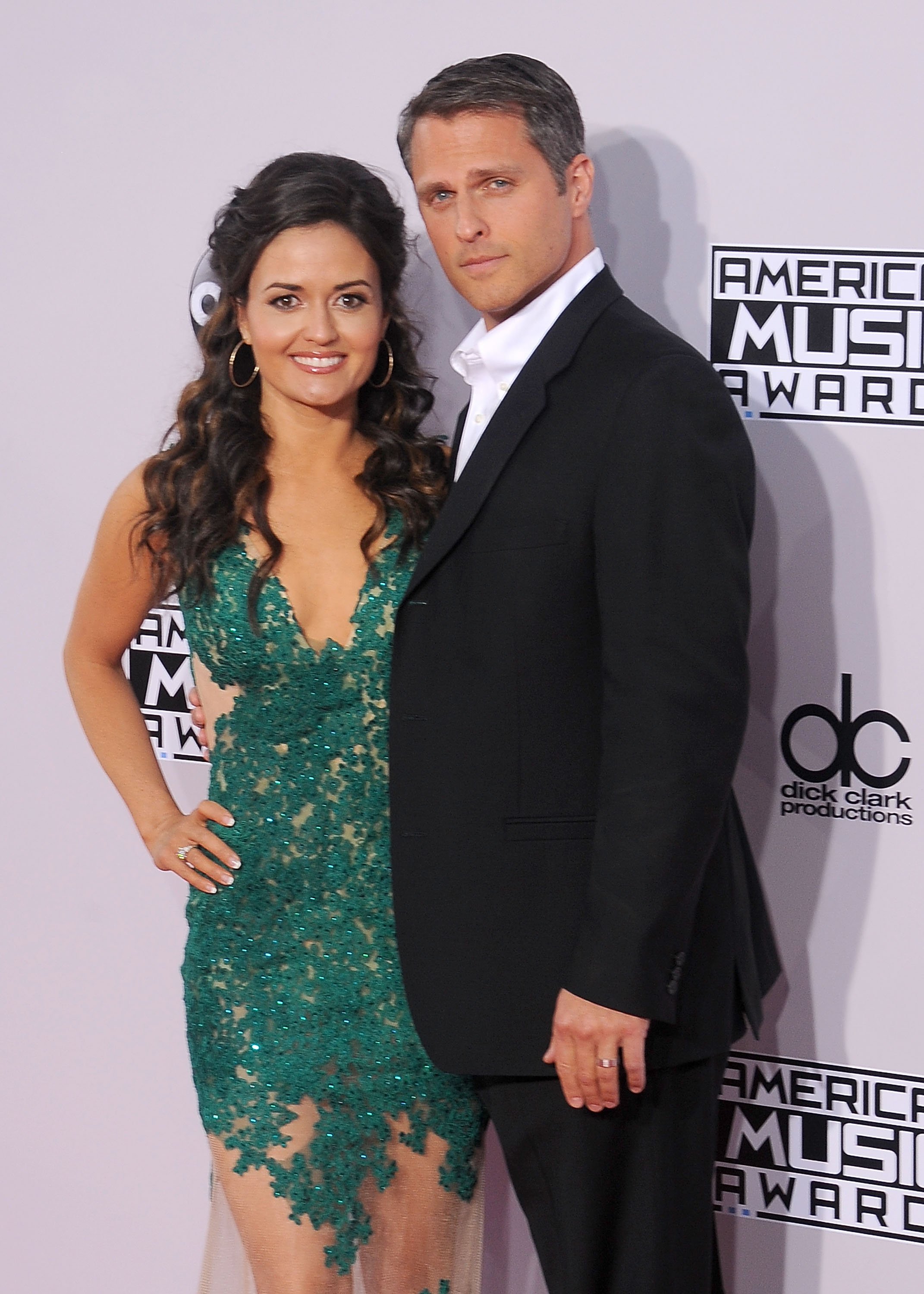 Danica McKellar and husband Scott Sveslosky arrive at the 2014 American Music Awards at Nokia Theatre L.A. Live on November 23, 2014 | Photo: GettyImages