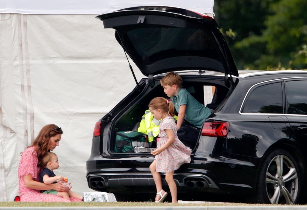 Kate Middleton and her kids, Prince Louis, Princess Charlotte, and Prince George attend the King Power Royal Charity Polo Match | Photo: Getty Images