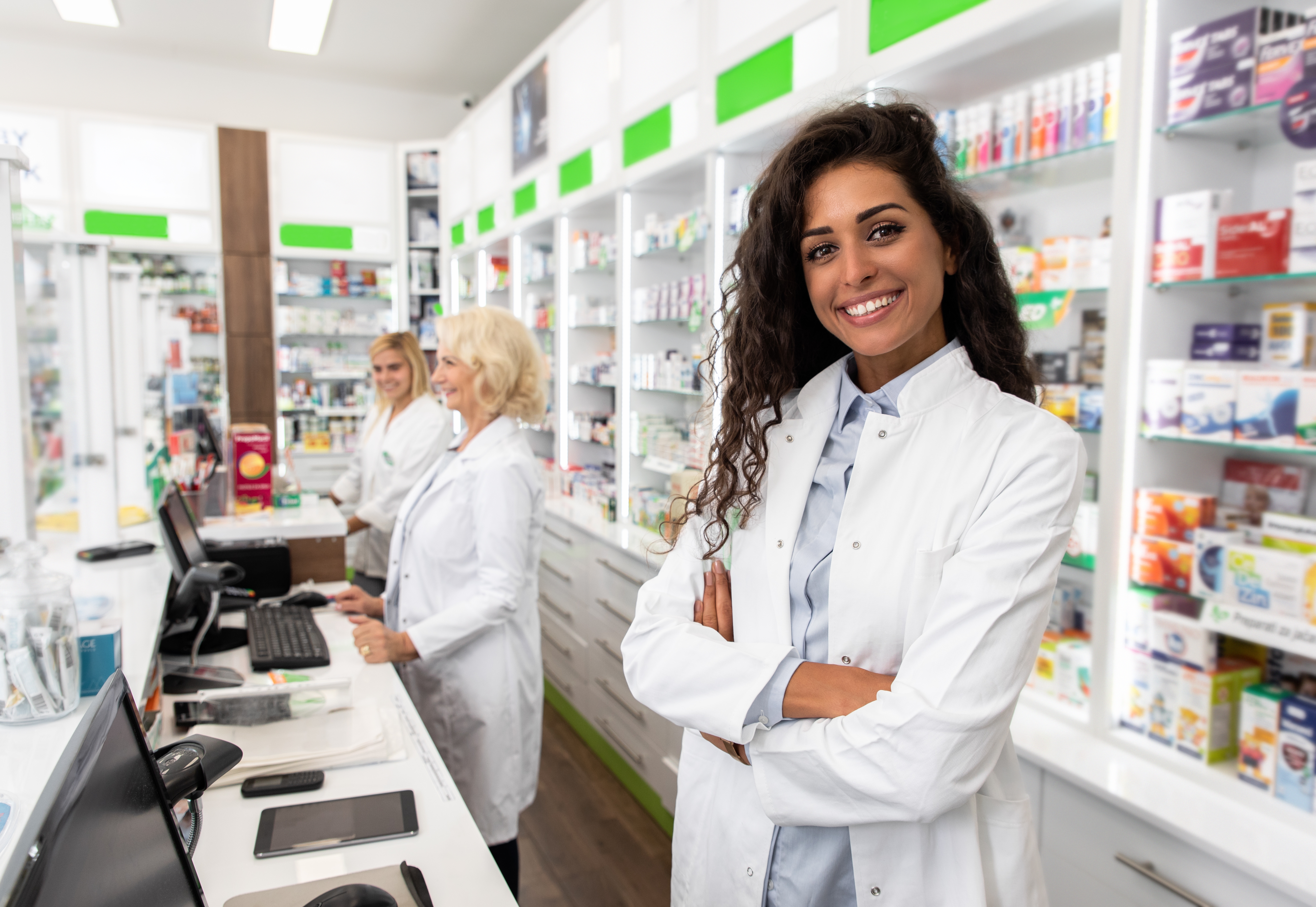 A woman working at a pharmacy | Source: Shutterstock