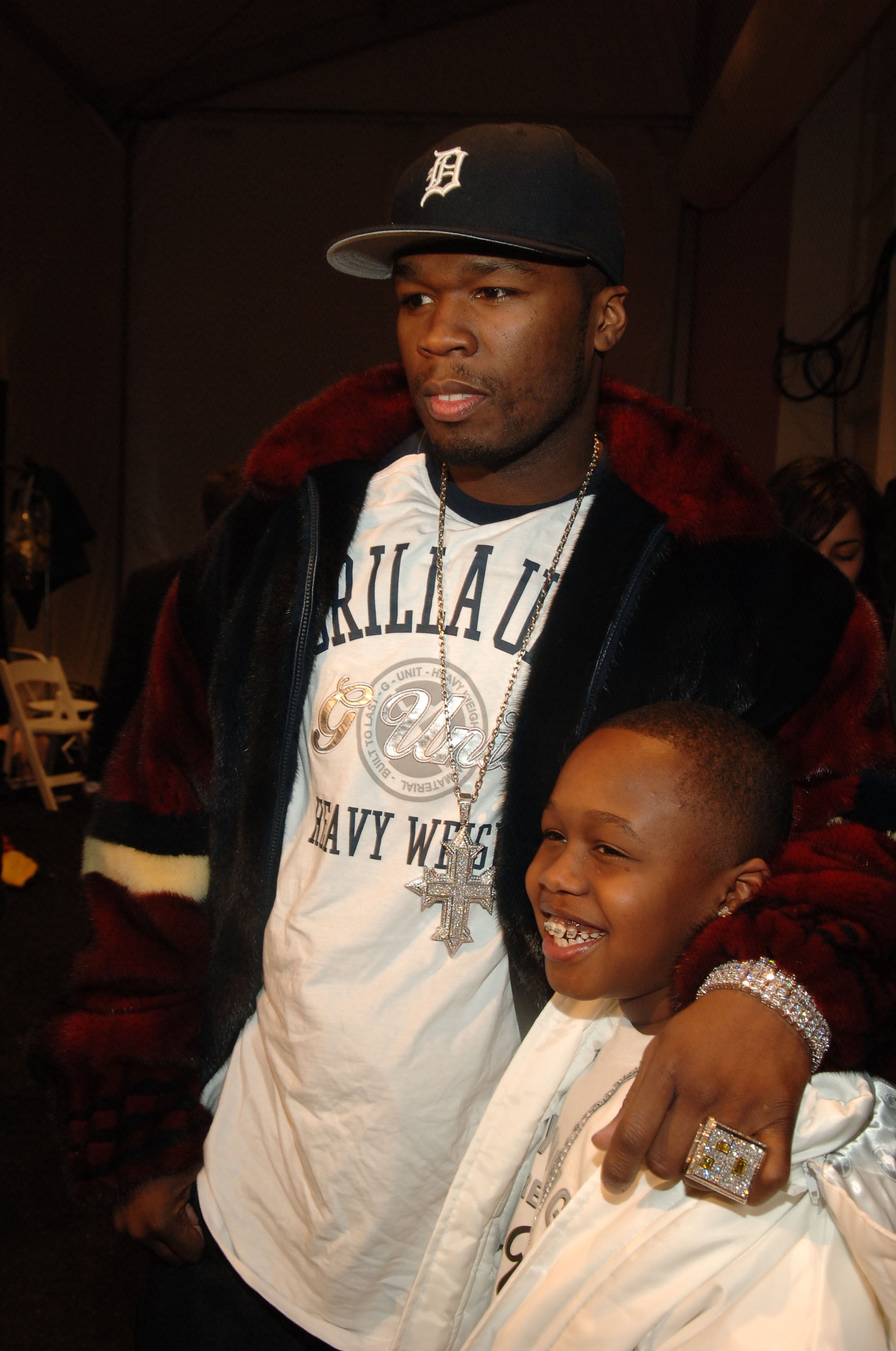 50 Cent and Marquis Jackson pose backstage at the Child Magazine Fall 2006 fashion show on February 6, 2006, in New York City. | Source: Getty Images