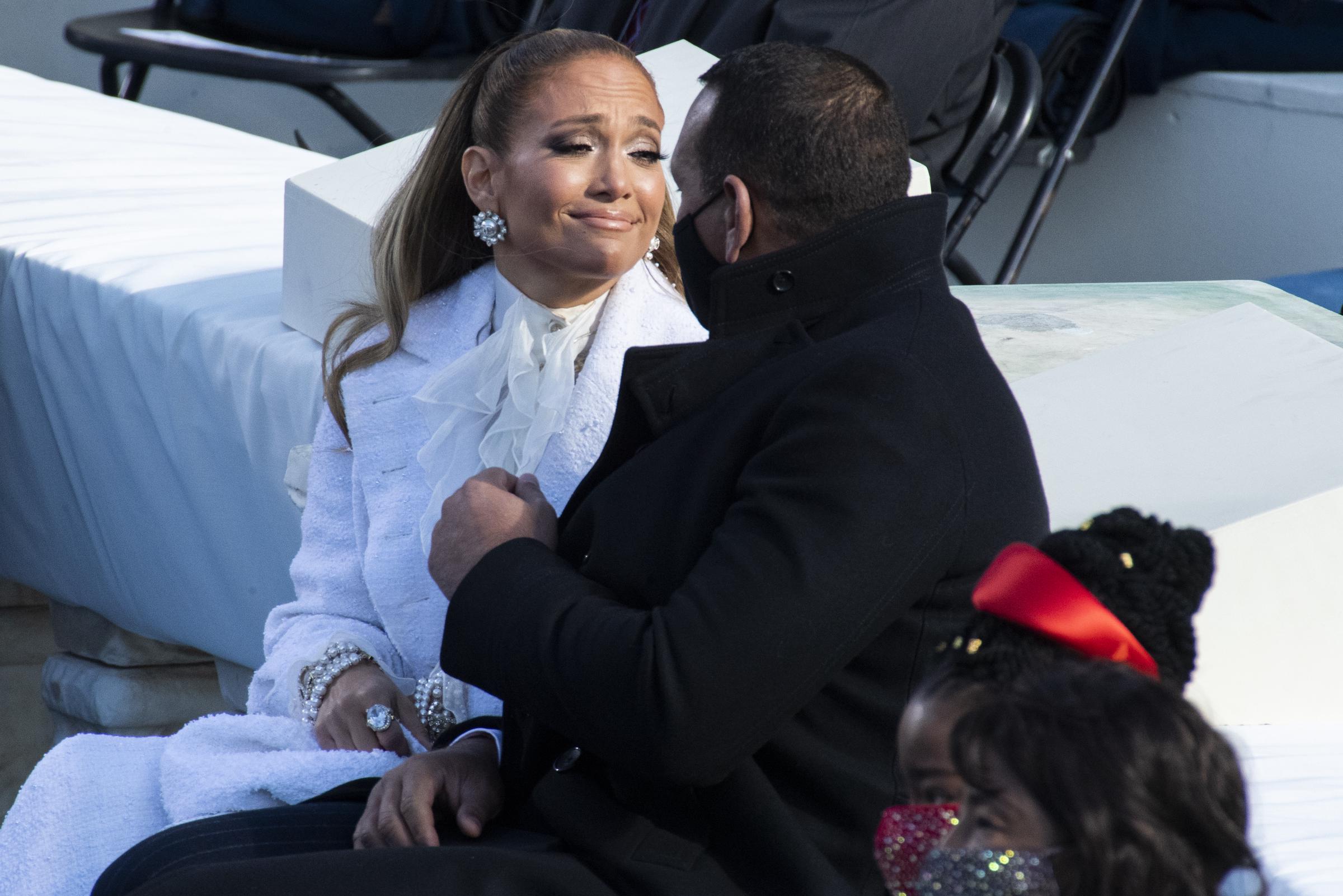 Jennifer Lopez talks with her husband Alex Rodriguez, after she performed at the POTUS inauguration on January 20, 2021 | Source: Getty Images