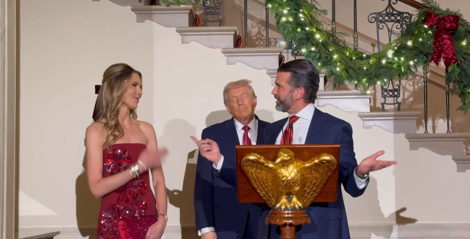 Donald Trump Jr. and his fiancée Bettina Anderson and President Donald Trump at the White House holiday event on December 15, 2025 | Source: X/LauraLoomer