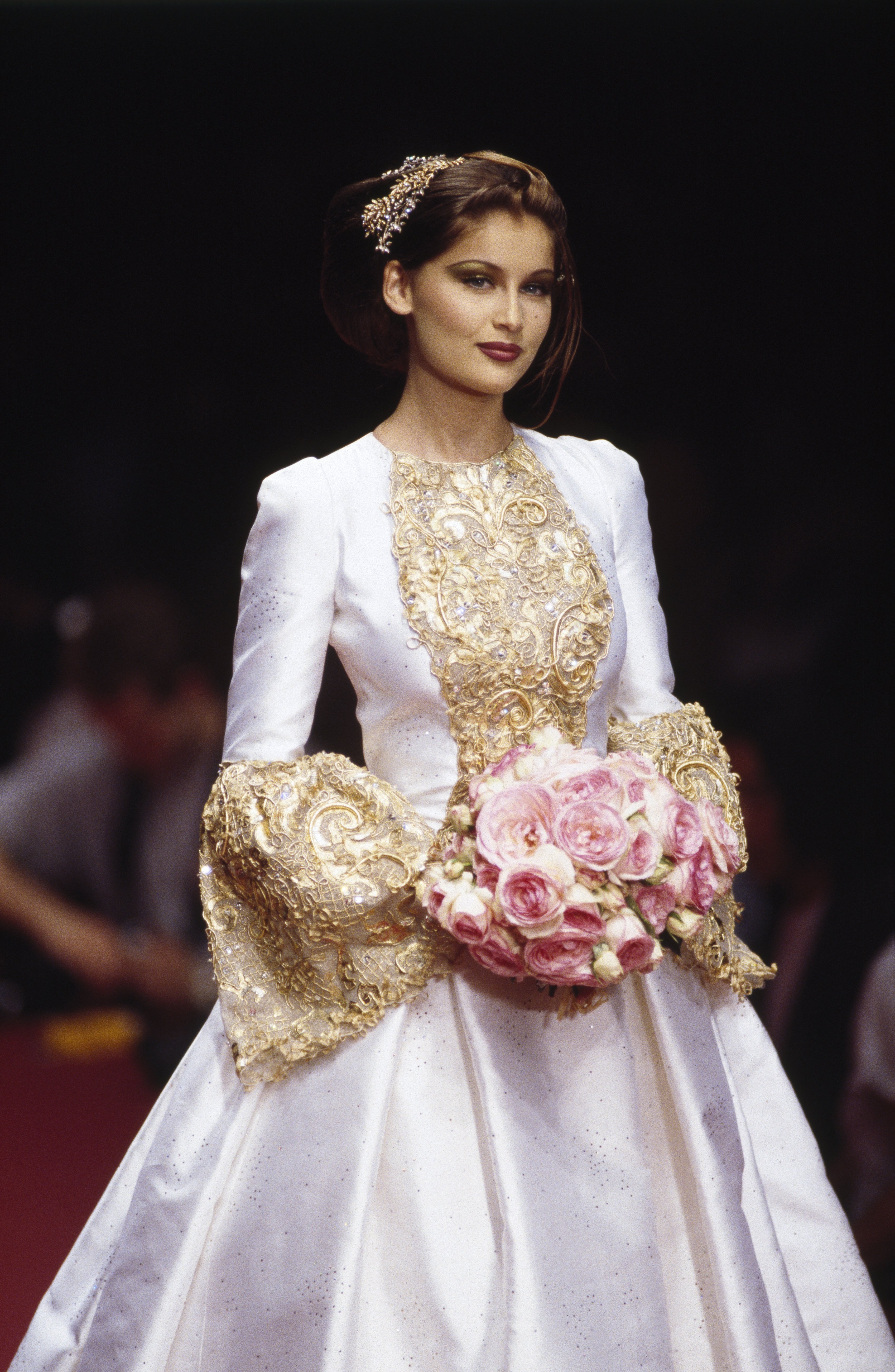 Laetitia Casta walking the runway for Ted Lapidus in the brand's Fall-Winter 1995-1996 Haute Couture collection on July 10, 1995 | Source: Getty Images