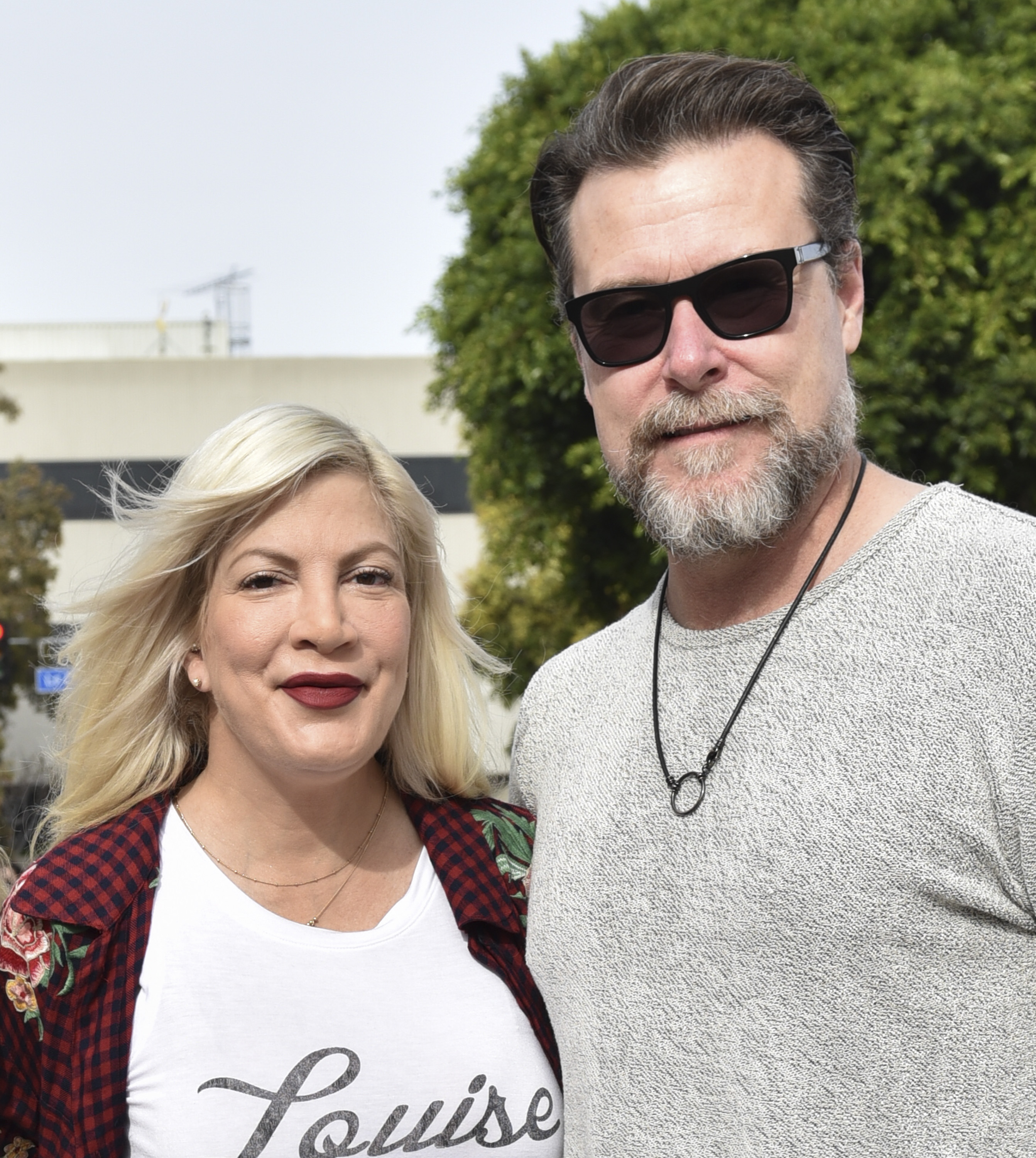 Tori Spelling and Dean McDermott pose for portrait at the premiere of Warner Bros. Pictures' "Paddington 2" After Party in Los Angeles, California, on January 6, 2018. | Source: Getty Images