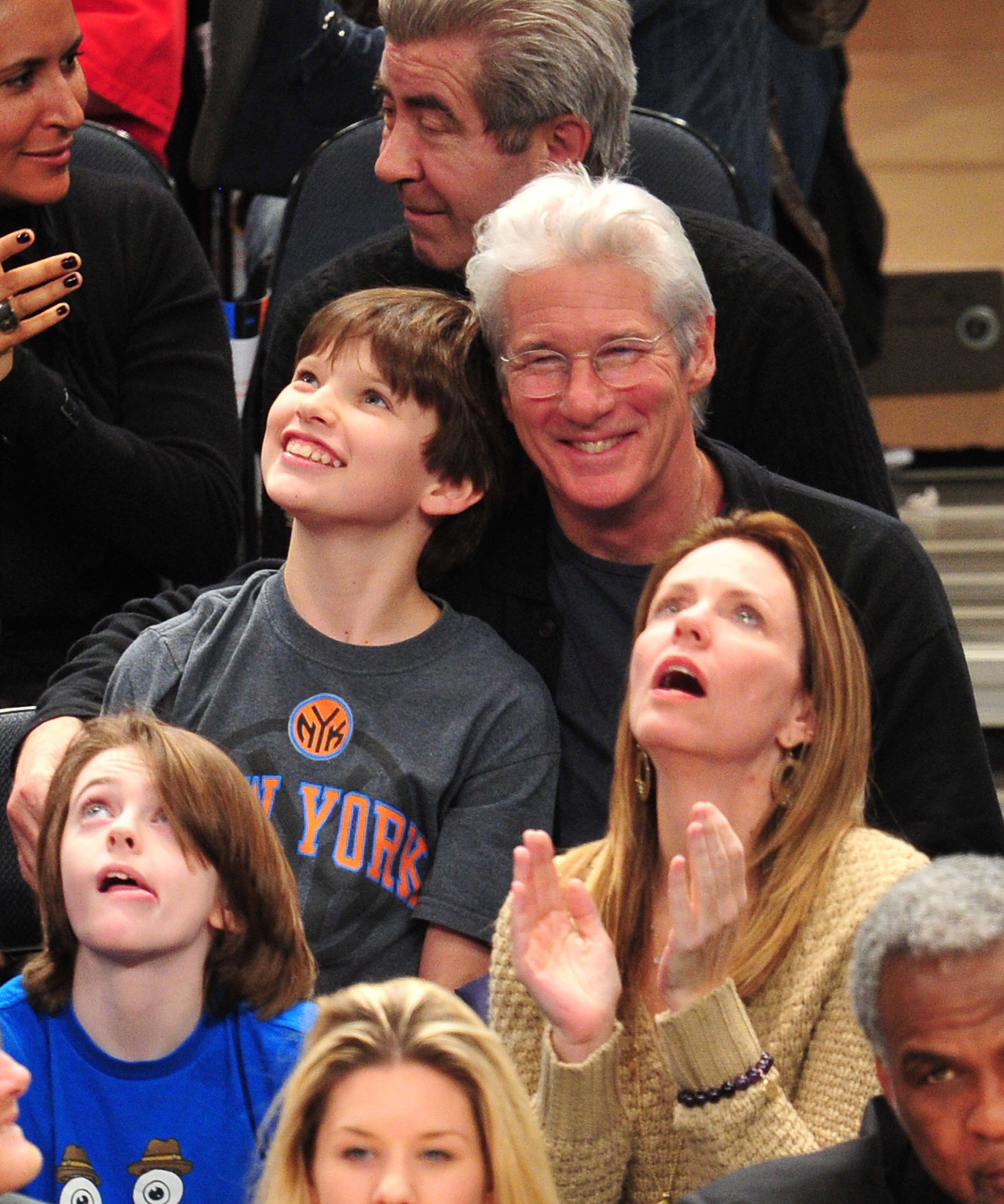 Homer James Jigme Gere and Richard Gere at a Chicago Bulls vs New York Knicks game in New York City on February 2, 2012 | Source: Getty Images