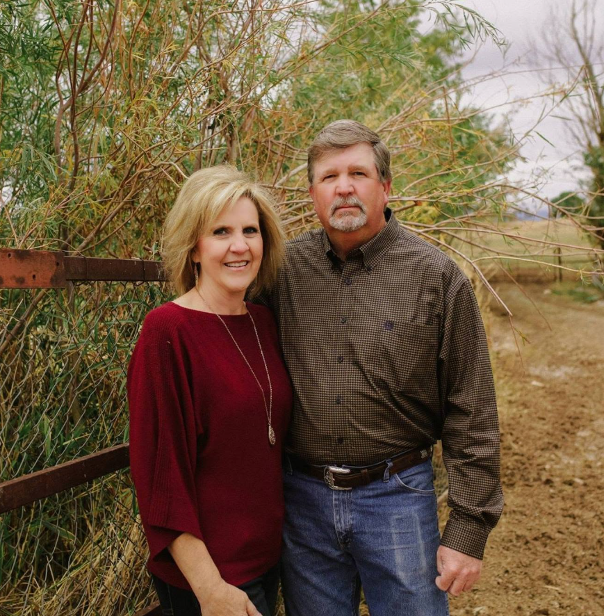 Wendi Long and her husband pose together in a family photo. Wendi later shared a statement honoring their son, Provo Fire & Rescue Capt. Spencer Long, along with his wife, Katrina, and their three sons following the fatal flash flood. | Source: Facebook/wendi.long.39