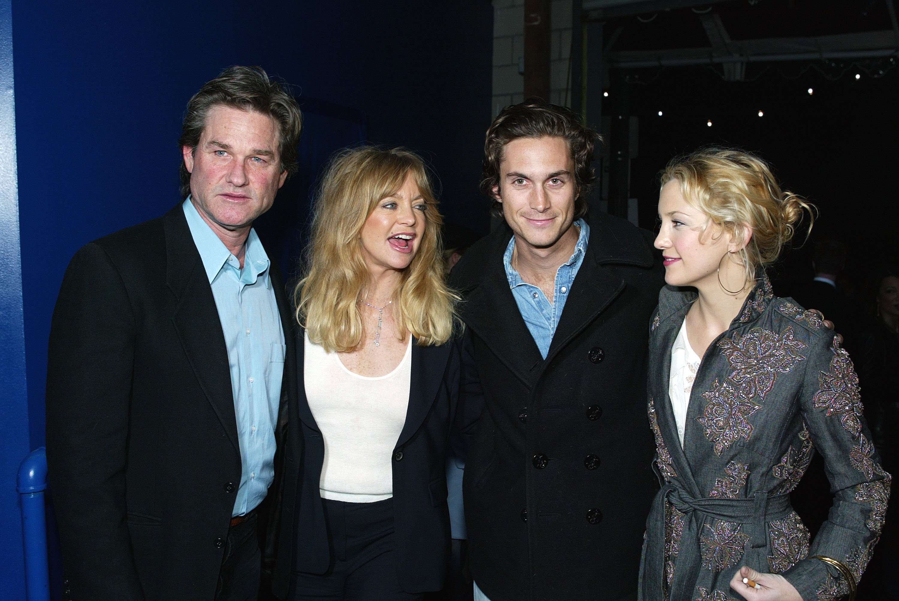 Actors (L-R) Kurt Russell, Goldie Hawn, Oliver Hudson and his sister Kate Hudson pose at the post-premiere party for "Dark Blue" on Febraury 12, 2003  | Source: Getty Images