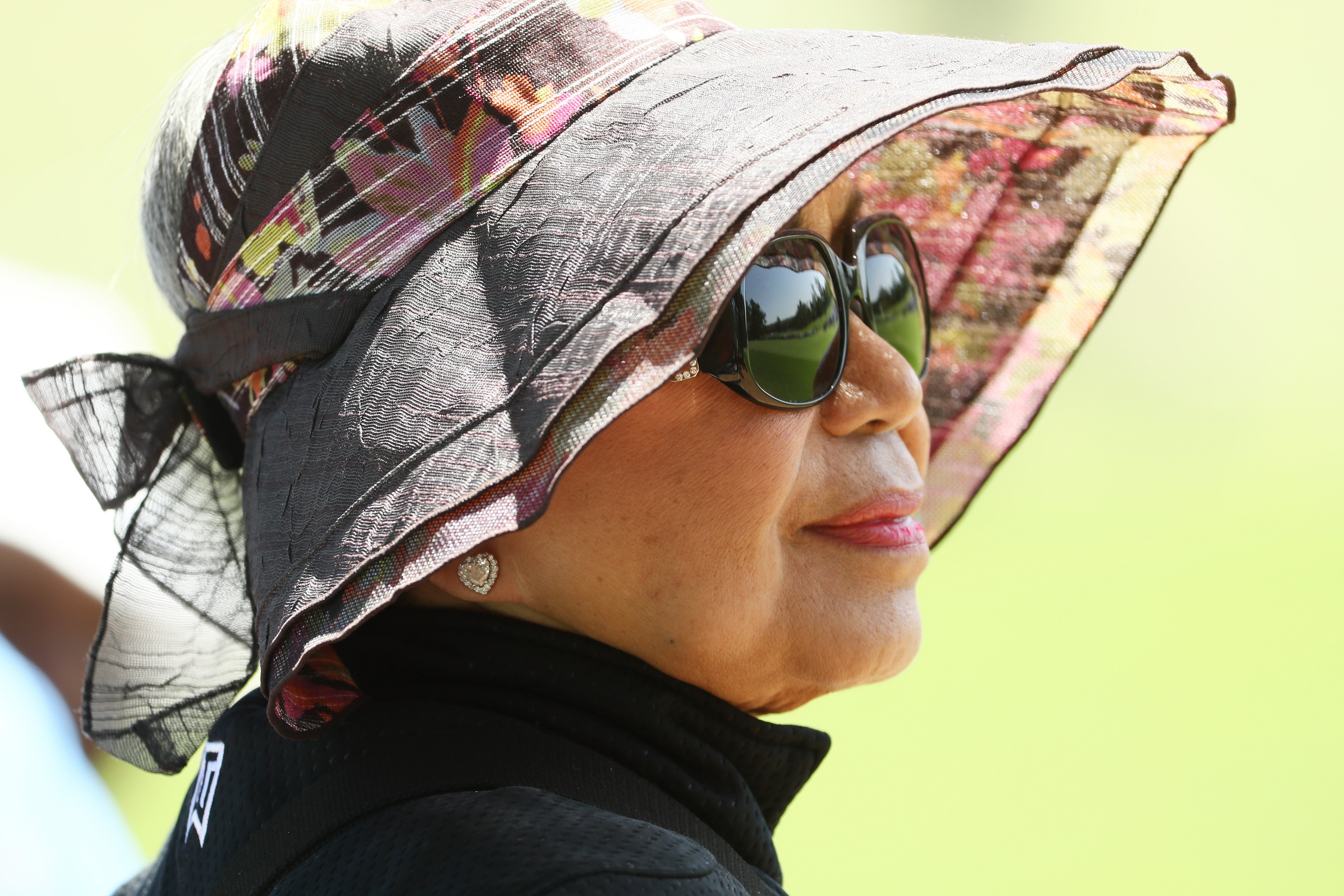 Kultida Woods, Tiger Woods’ mom, watches play during the first round of the 2018 Masters Tournament at Augusta National Golf Club, on April 5, 2018, in Augusta, Georgia. | Source: Getty Images