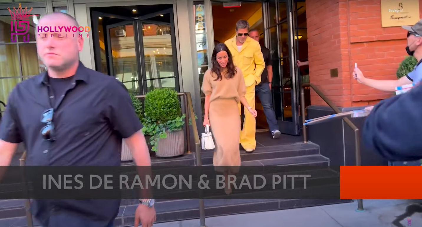 Ines de Ramon and Brad Pitt exiting a hotel in New York City, posted on September 10, 2024 | Source: YouTube/Hollywood Pipeline