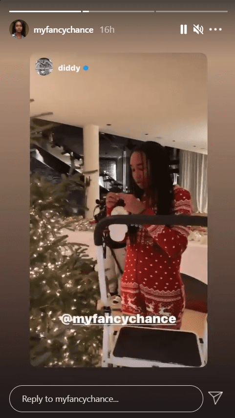 Chance Combs decorating a Christmas tree on Instagram | Photo: Instagram/myfancychance