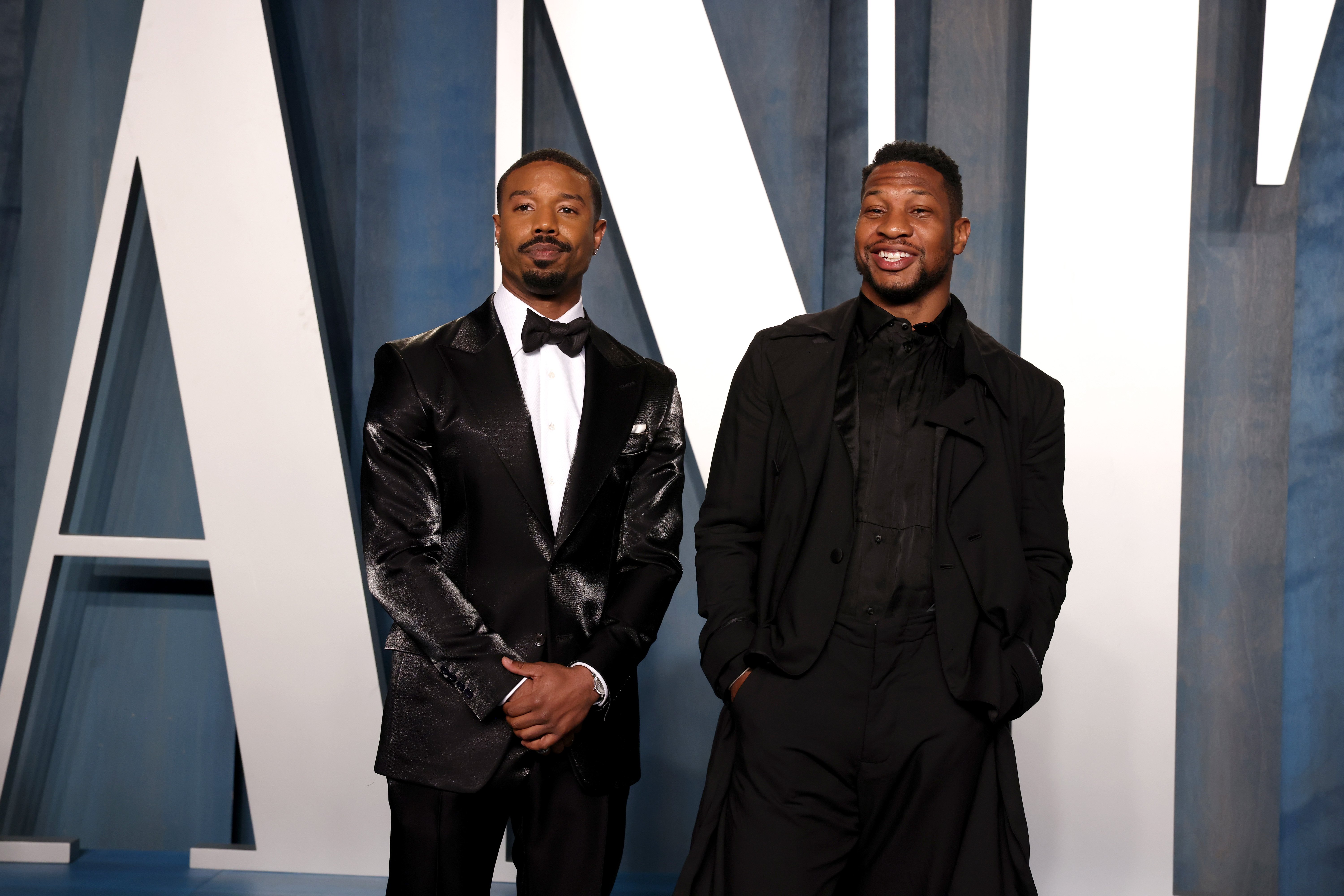 Michael B. Jordan and Jonathan Majors at the Vanity Fair Oscar Party at Wallis Annenberg Center for the Performing Arts in Beverly Hills, California, on March 27, 2022. | Source: Getty Images