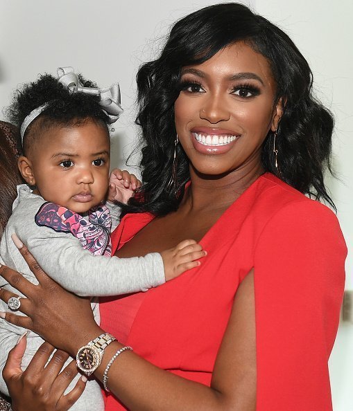 Porsha Williams and her daughter Pilar Jhena at AmericasMart in October 2019 | Source: Getty Images/GlobalImagesUkraine