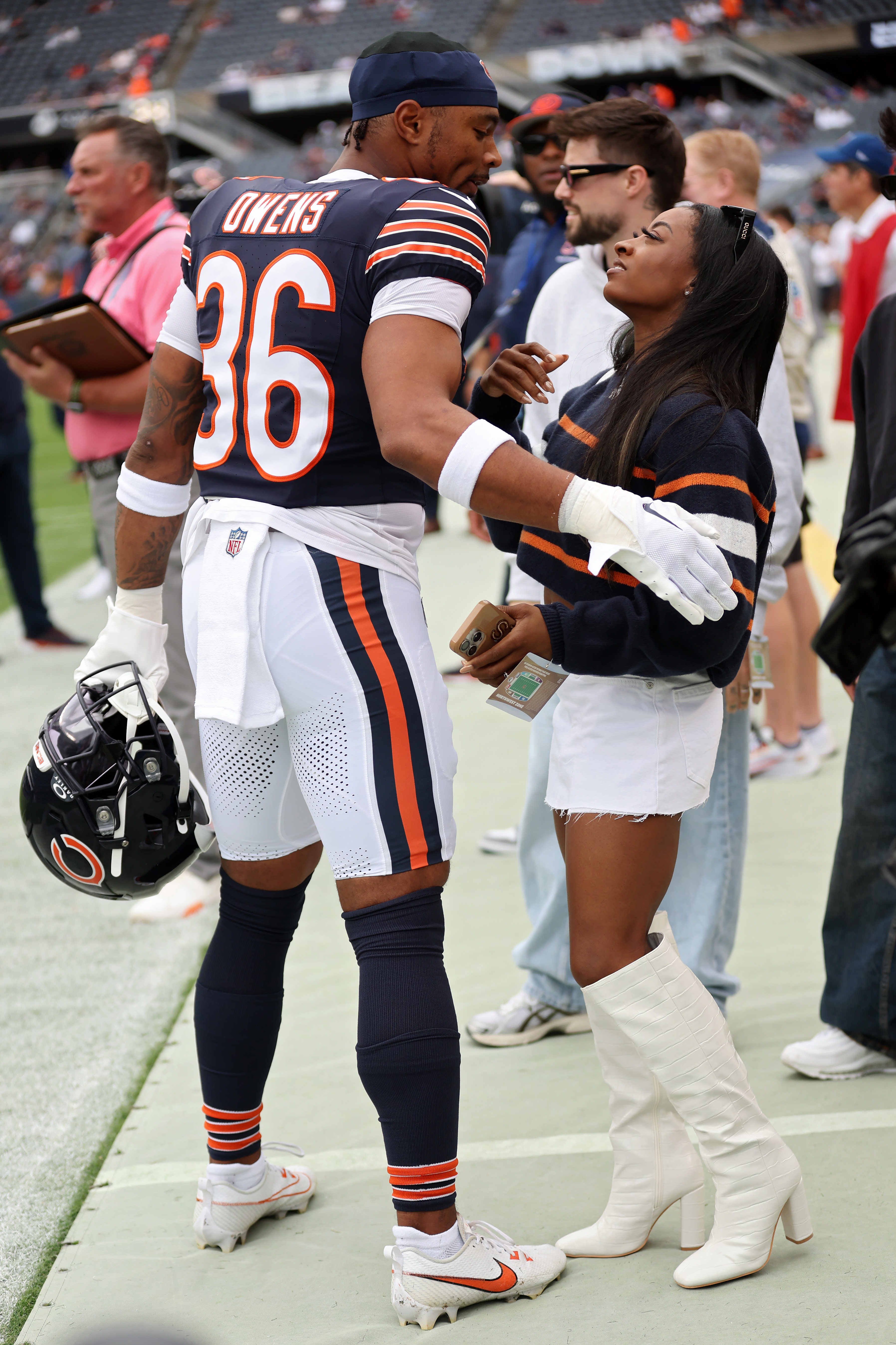 Gymnast Simone Biles hugs her husband Jonathan Owens at Soldier Field on September 29, 2024, in Chicago, Illinois | Source: Getty Images