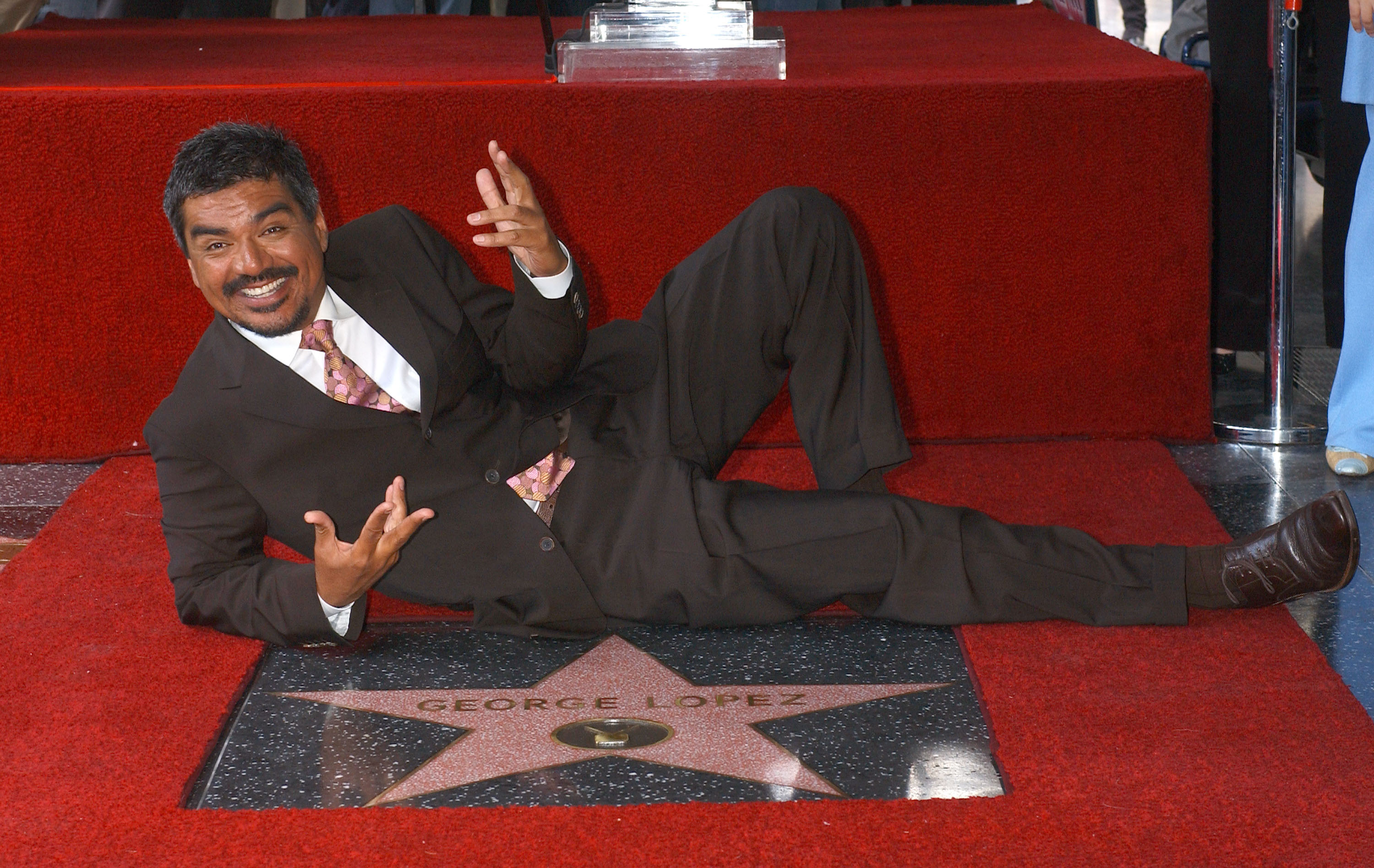 George Lopez posing next to his star on the Hollywood Walk of Fame in Hollywood, California in 2006. | Source: Getty Images