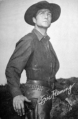 Photo postcard of Eric Fleming from the television series "Rawhide." | Source: Wikimedia Commons. 