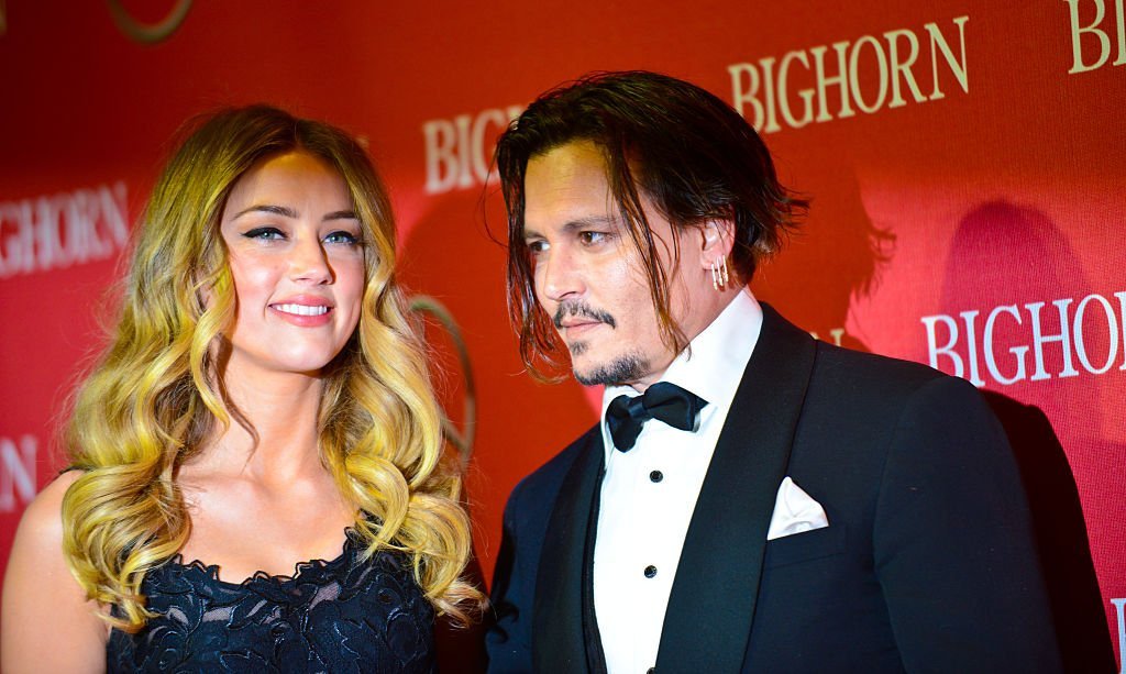 Amber Heard and Johnny Depp arrive for the 27th Annual Palm Springs International Film Festival Awards Gala held at Palm Springs Convention Center on January 2, 2016 in Palm Springs, California. | Photo: Getty Images Amber Heard and Johnny Depp arrive for the 27th Annual Palm Springs International Film Festival Awards Gala held at Palm Springs Convention Center on January 2, 2016 in Palm Springs, California. | Photo: Getty Images