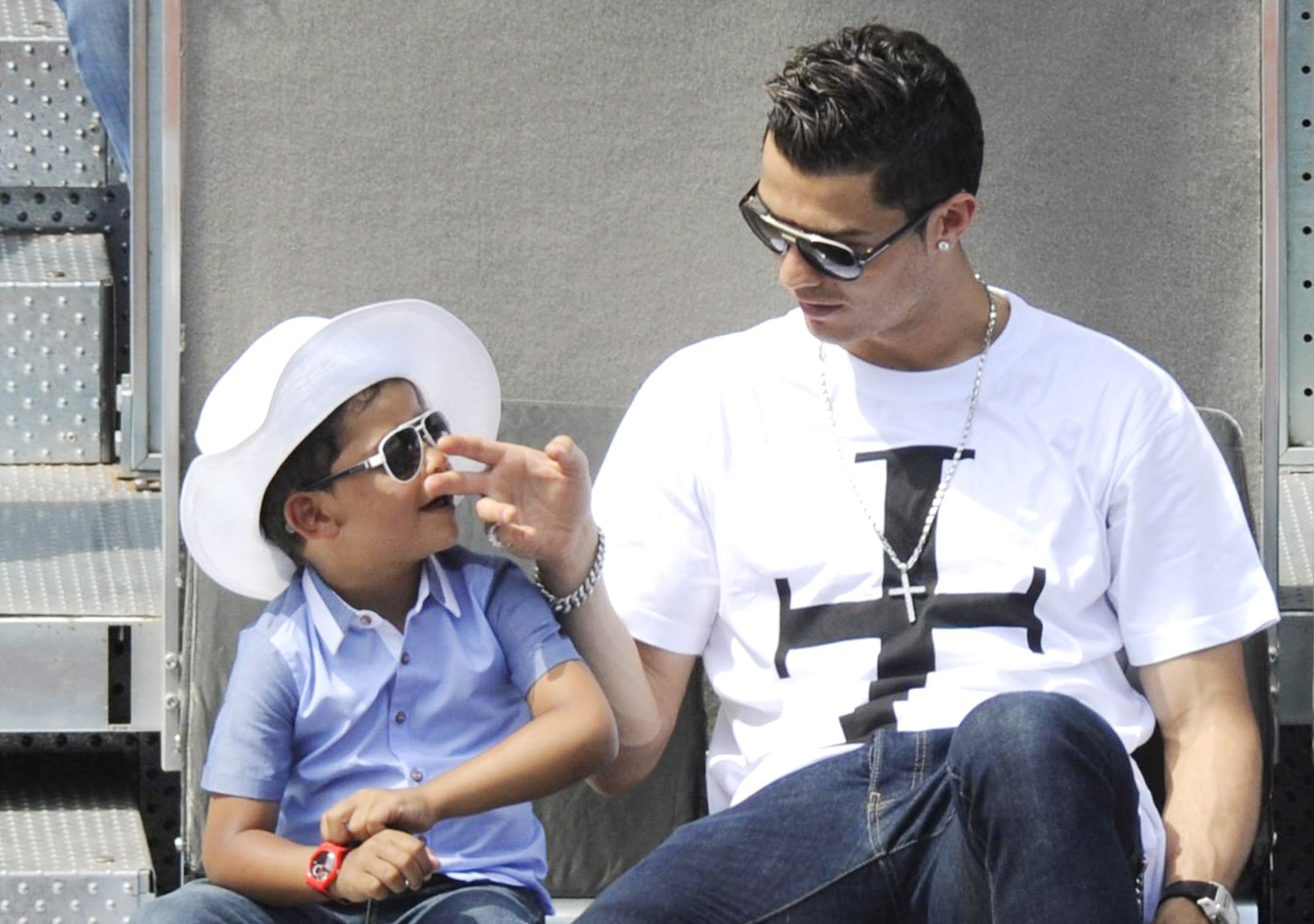 Cristiano Ronaldo and Cristiano Ronaldo Jr. at the Mutua Madrid Open tennis tournament on May 8, 2014 | Source: Getty Images