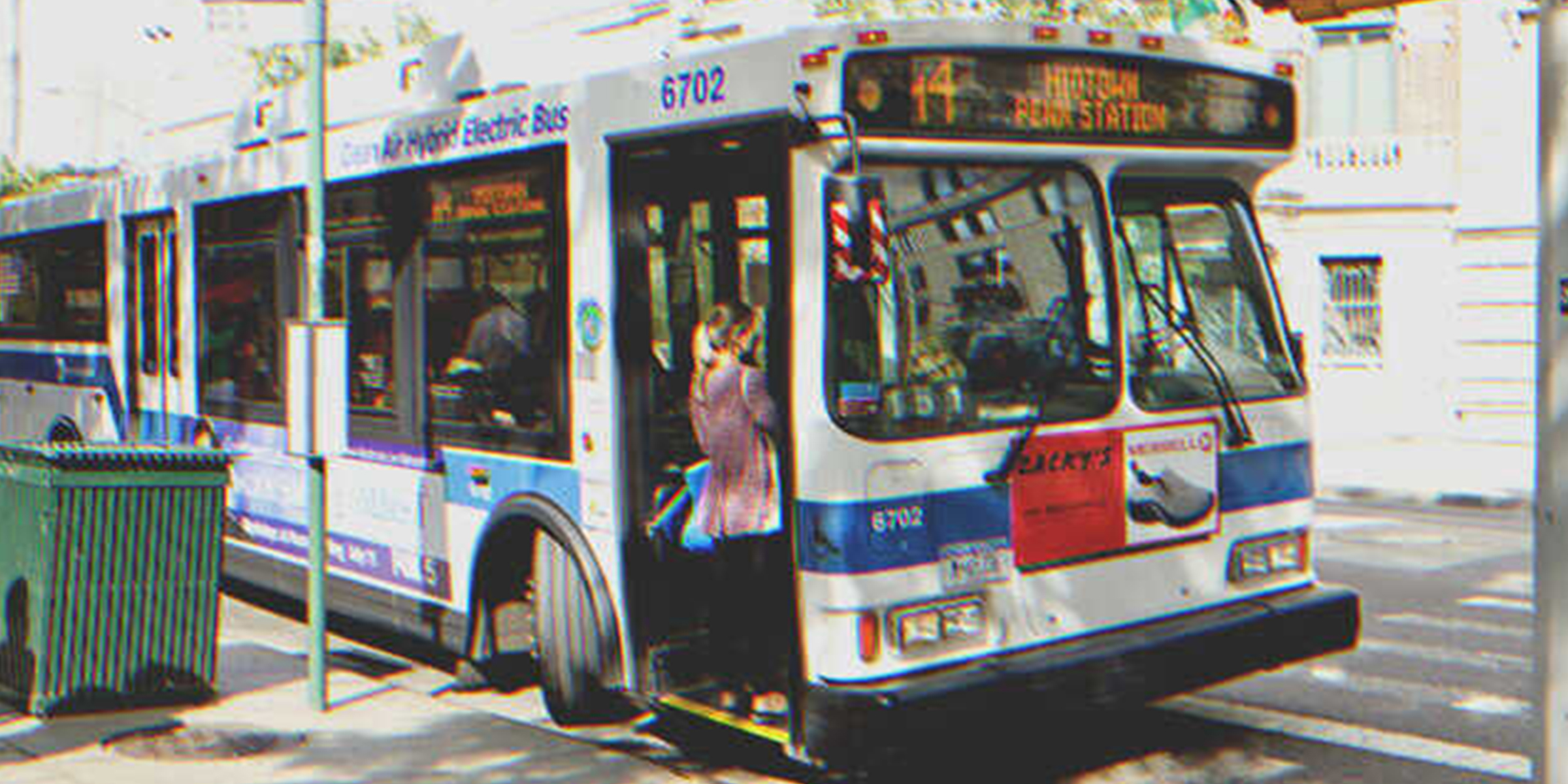 A woman getting on a bus | Source: Shutterstock