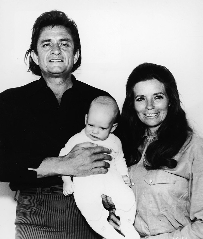 Johnny Cash, his wife June Carter, and their son John. I Image: Getty Images.