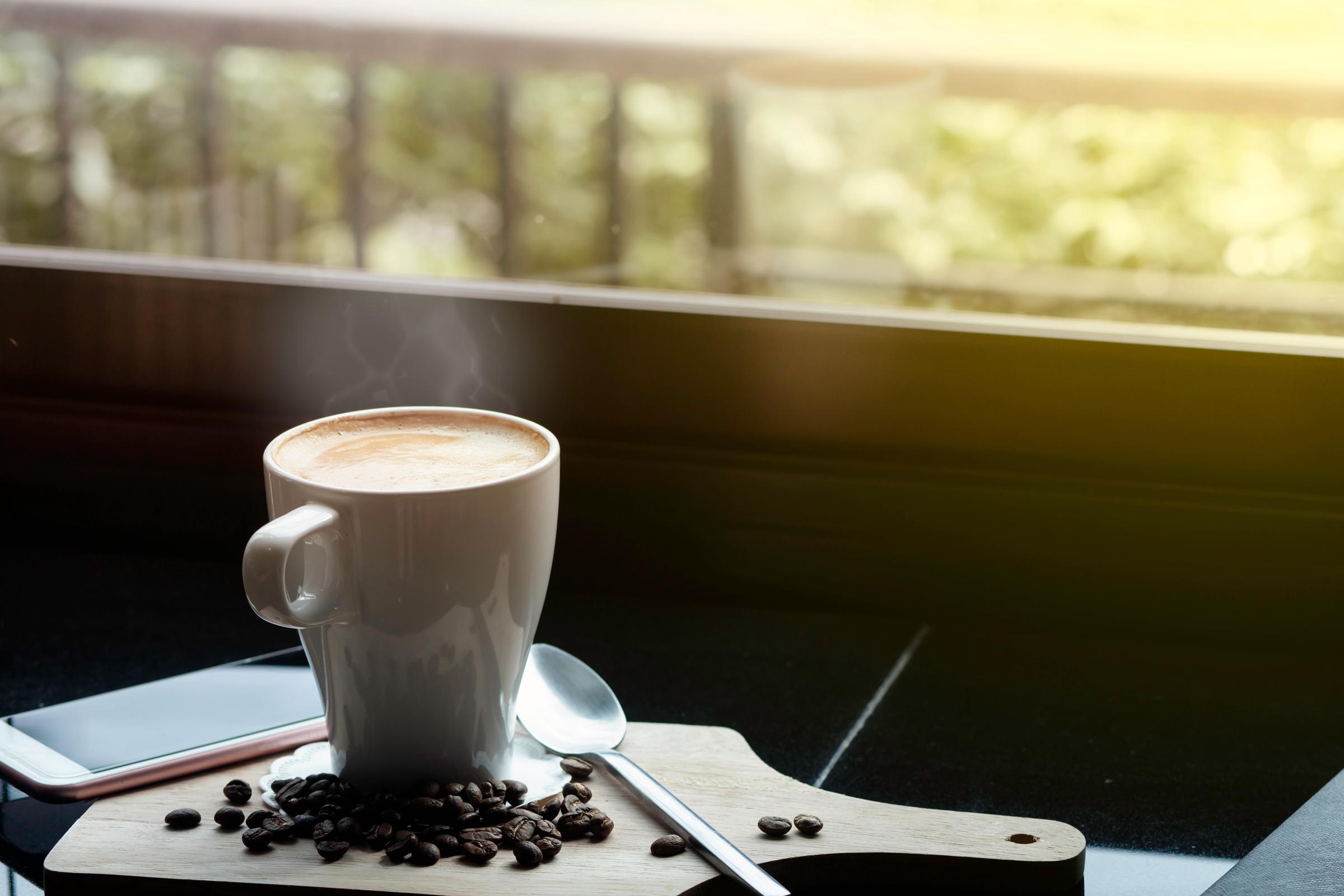 A cup of hot coffee in the morning | Source: Shutterstock