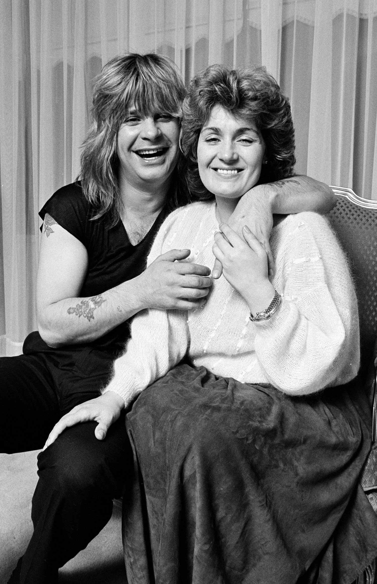 Singer-songwriter Ozzy Osbourne pictured with his wife, music manager Sharon Osbourne. / Source: Getty Images