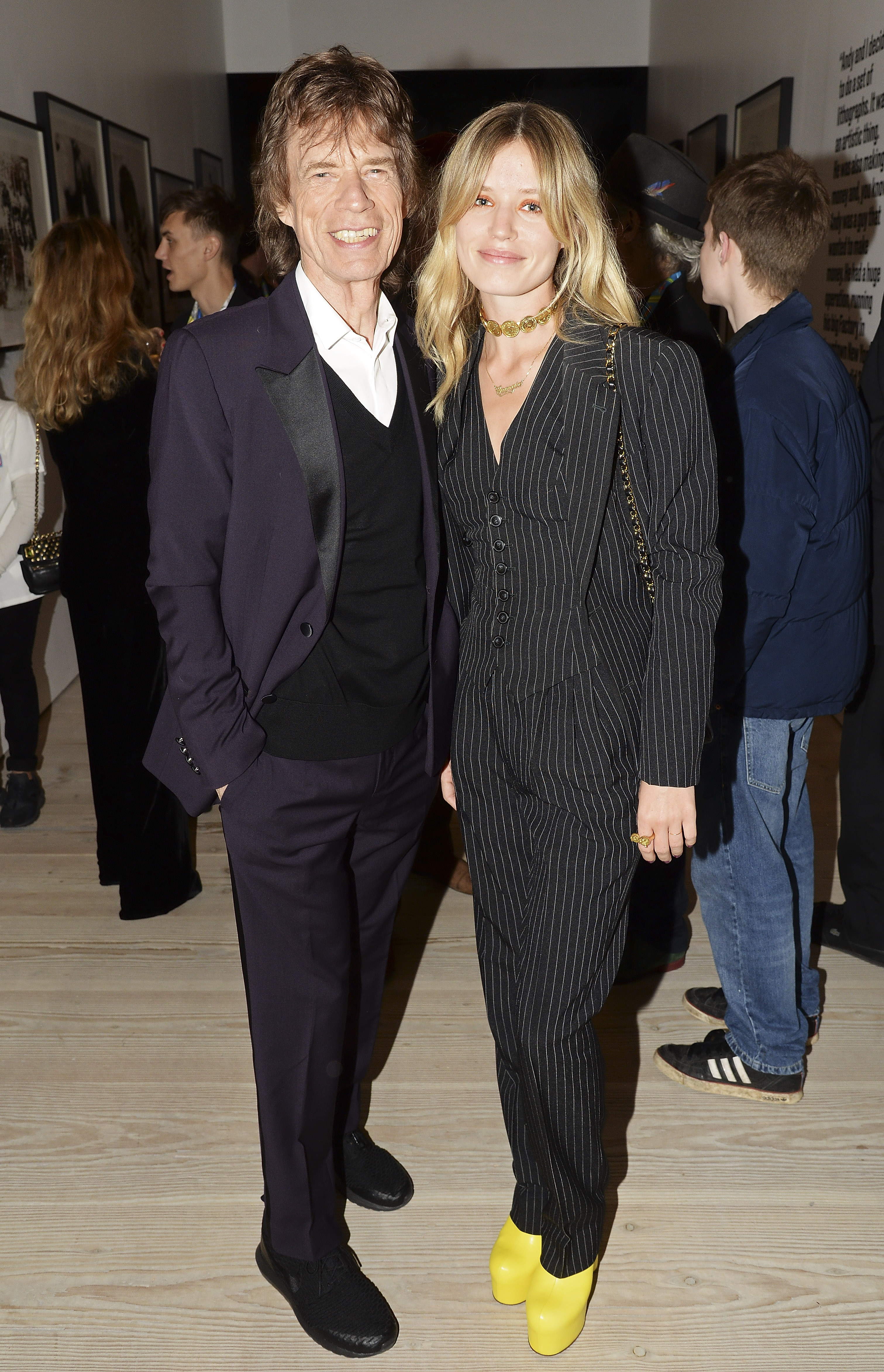 Mick Jagger (L) with daughter Georgia May Jagger during an after party for 'The Rolling Stones: Exhibitionism' at Saatchi Gallery on April 4, 2016 in London, England | Source: Getty Images