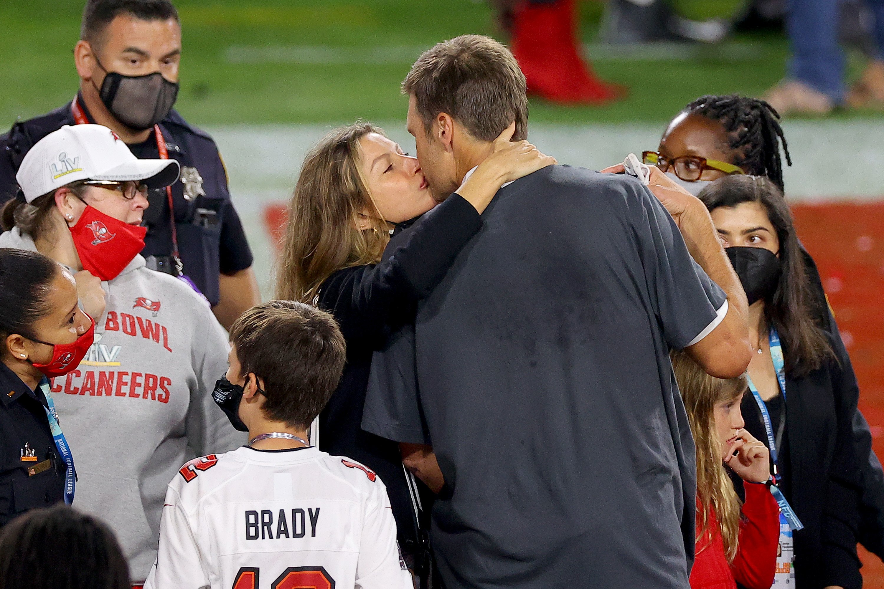 Tom Brady #12 of the Tampa Bay Buccaneers celebrates with Gisele Bundchen after winning Super Bowl LV at Raymond James Stadium on February 7, 2021 in Tampa, Florida. | Source: Getty Images