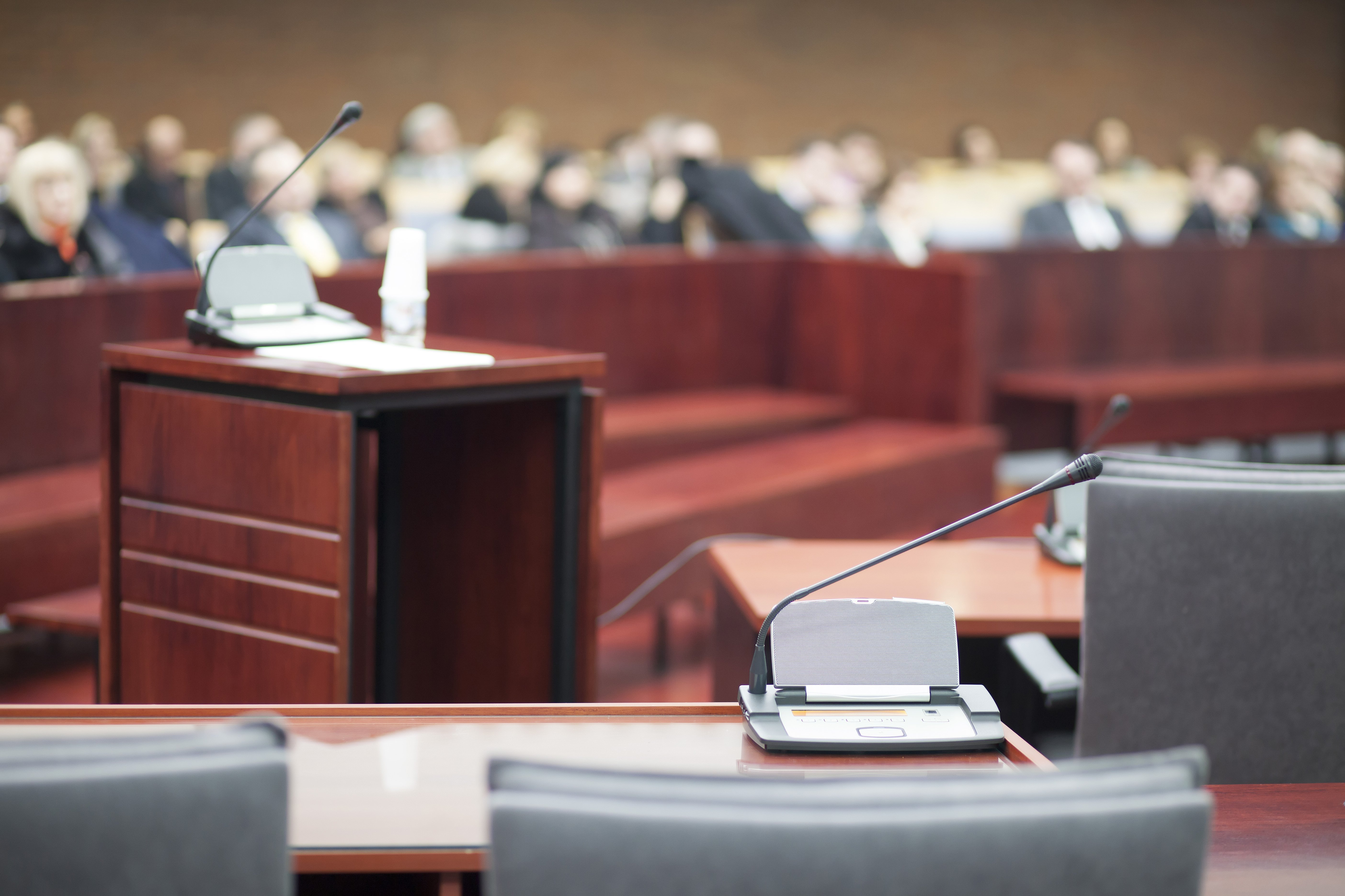 Witness stand in court. Image credit: Pixabay