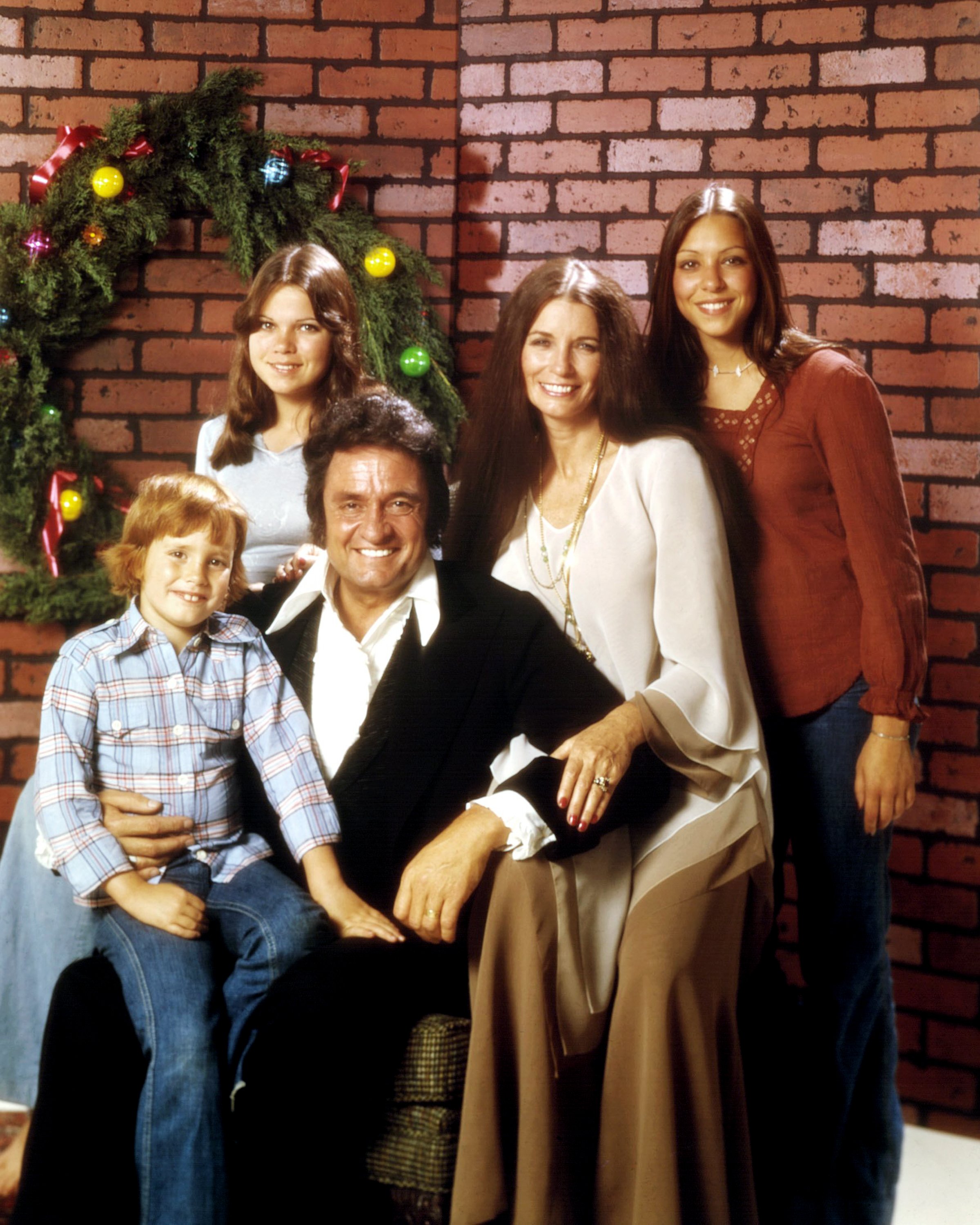 ohnny Cash (1932 - 2003) with his wife June Carter Cash (1929 - 2003) and three of their children, circa 1976. | Photo: Getty Images
