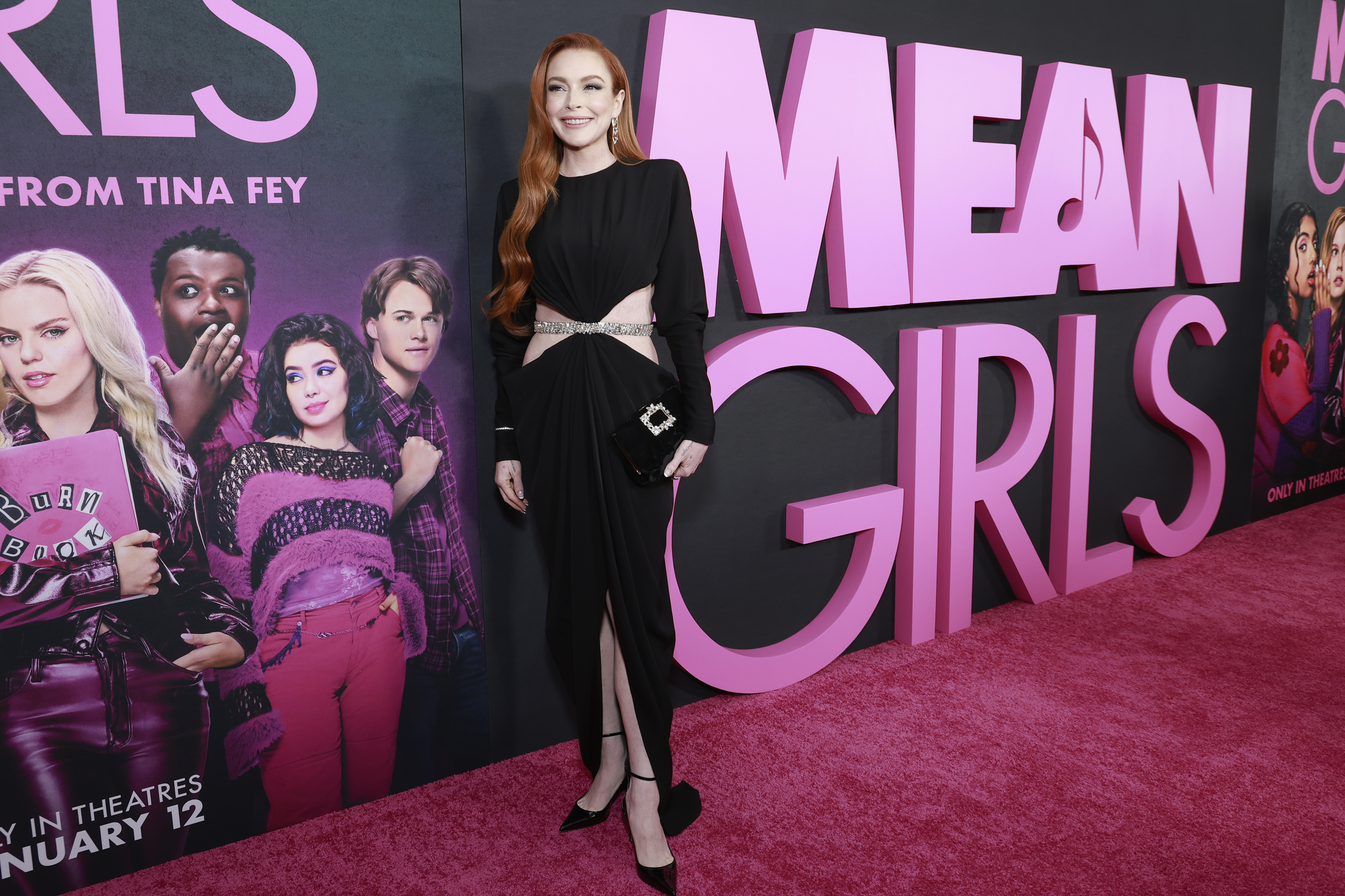 Lindsay Lohan poses on the red carpet at the "Mean Girls" premiere on January 8, 2024, in New York. | Source: Getty Images