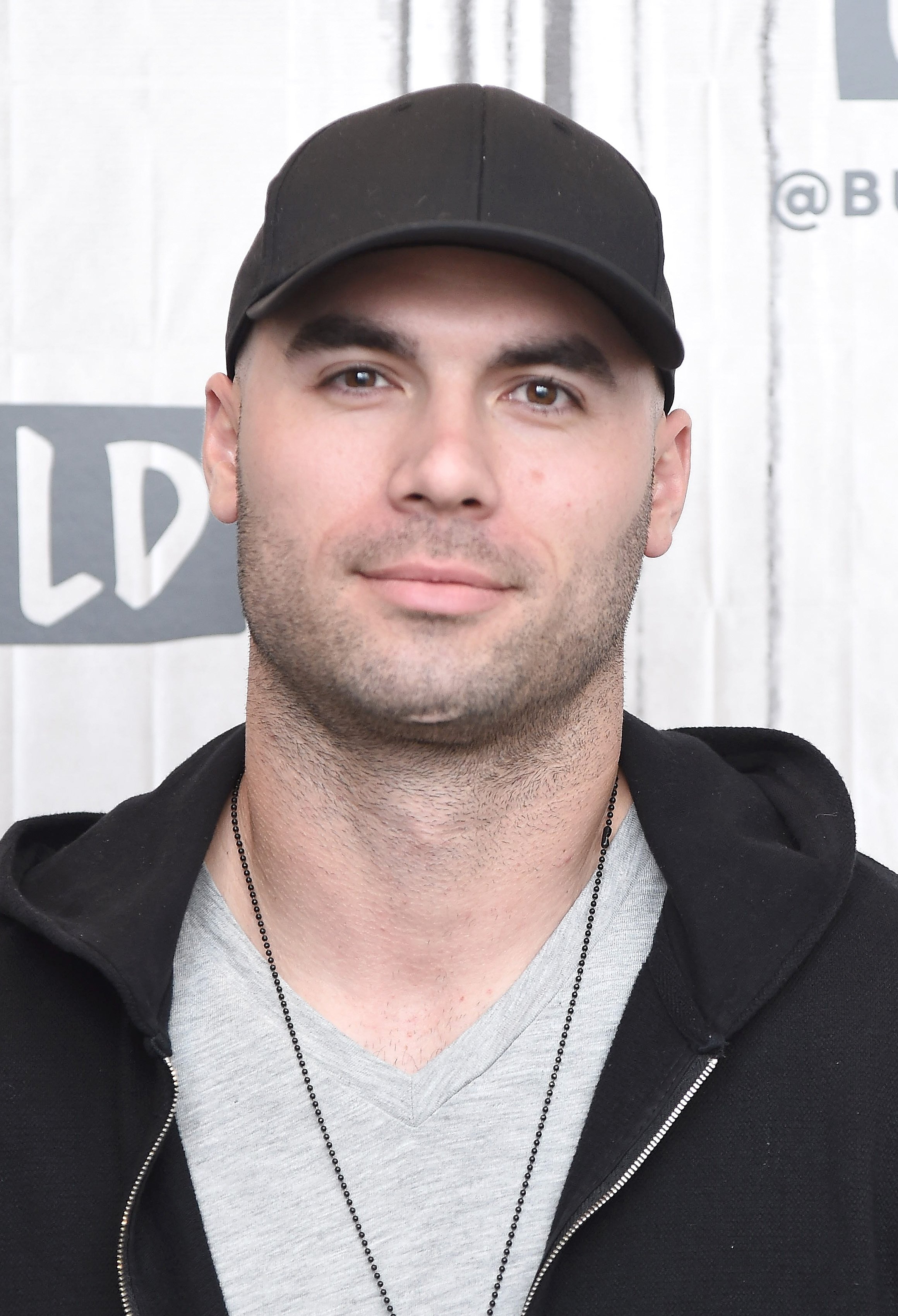 Mike Caussin is photographed during his visit at the Buiid Series to discuss the podcast ,'Whine Down with Jana and Mike,' at Build Studio on May 17, 2019, in New York City | Source: Getty Images