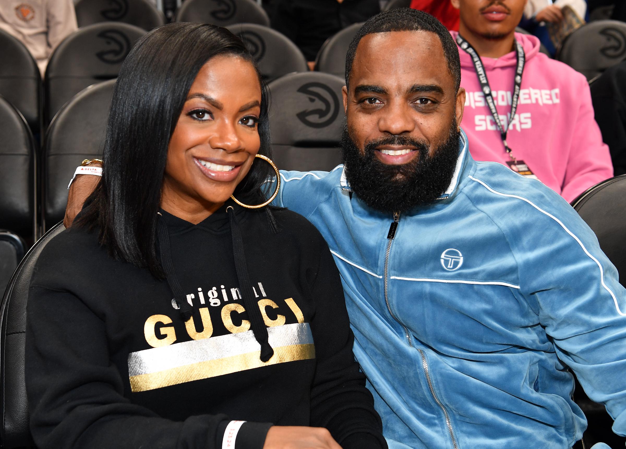 Kandi Burruss and Todd Tucker attend the game between the Atlanta Hawks and the Charlotte Hornets at State Farm Arena in Georgia  on March 23, 2024. | Source: Getty Images