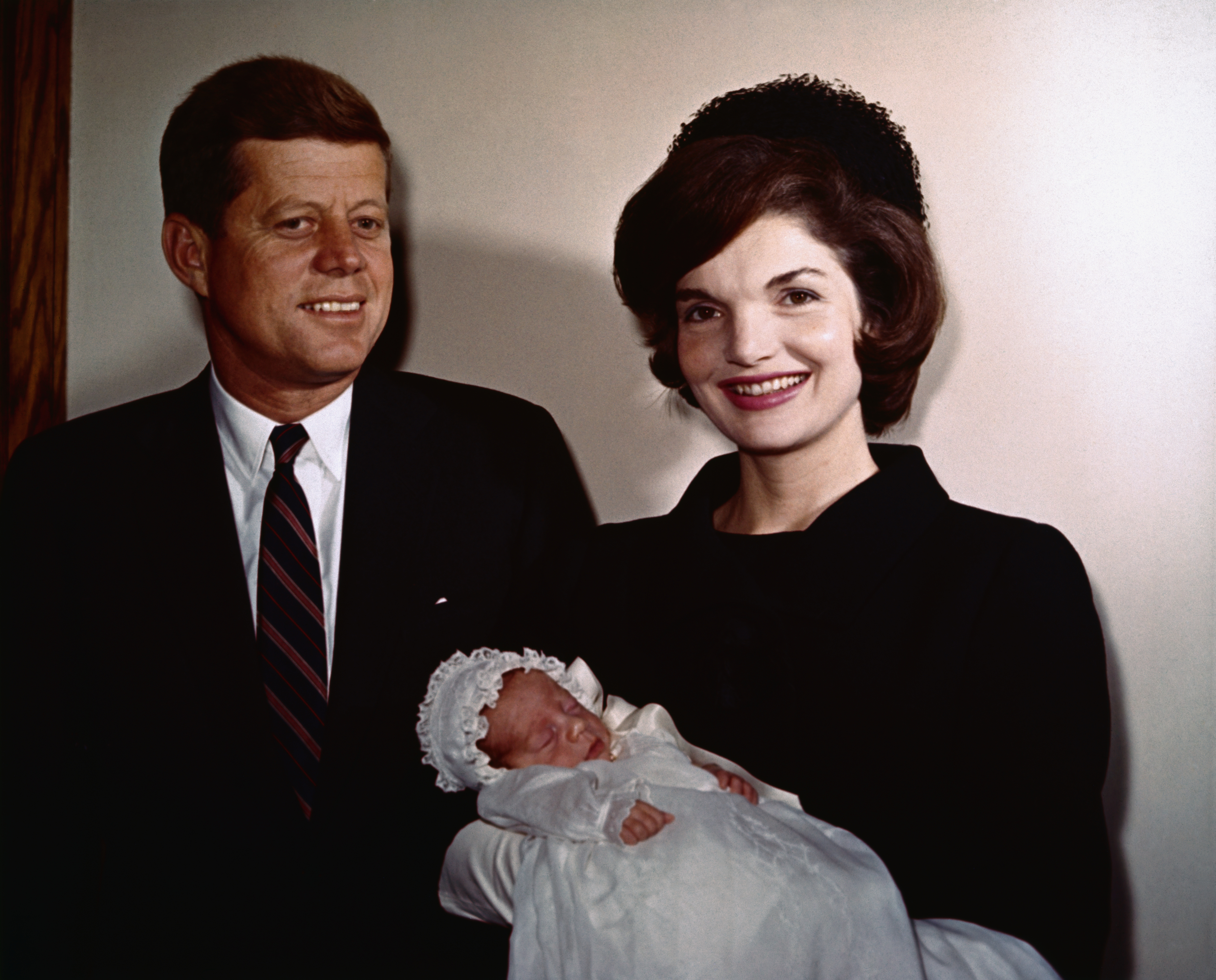 President John F. Kennedy and First Lady Jacqueline Kennedy with their newborn son, John F. Kennedy Jr., during his christening on December 8, 1960 | Source: Getty Images
