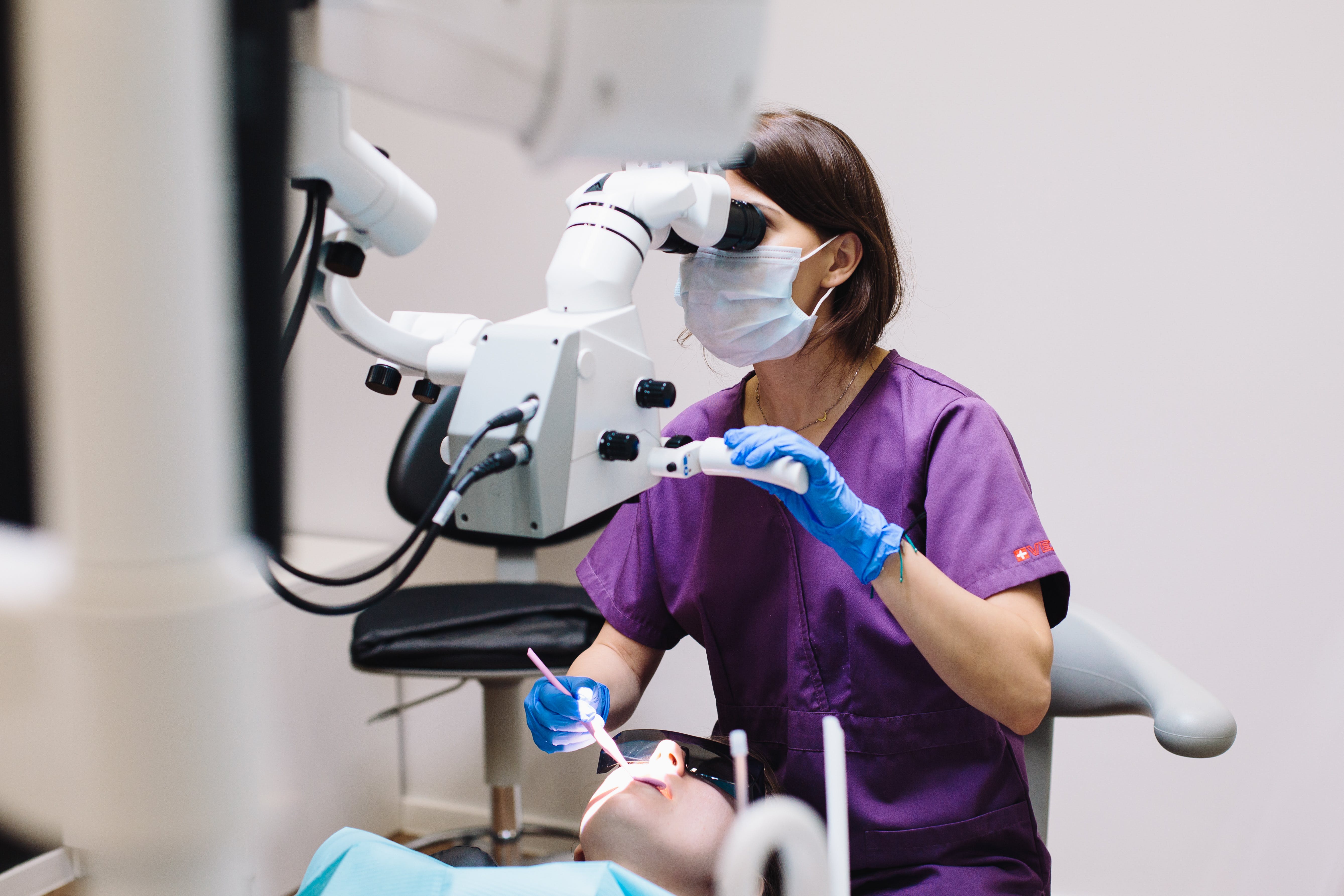 Dentist examining a patient. | Source: Pexels