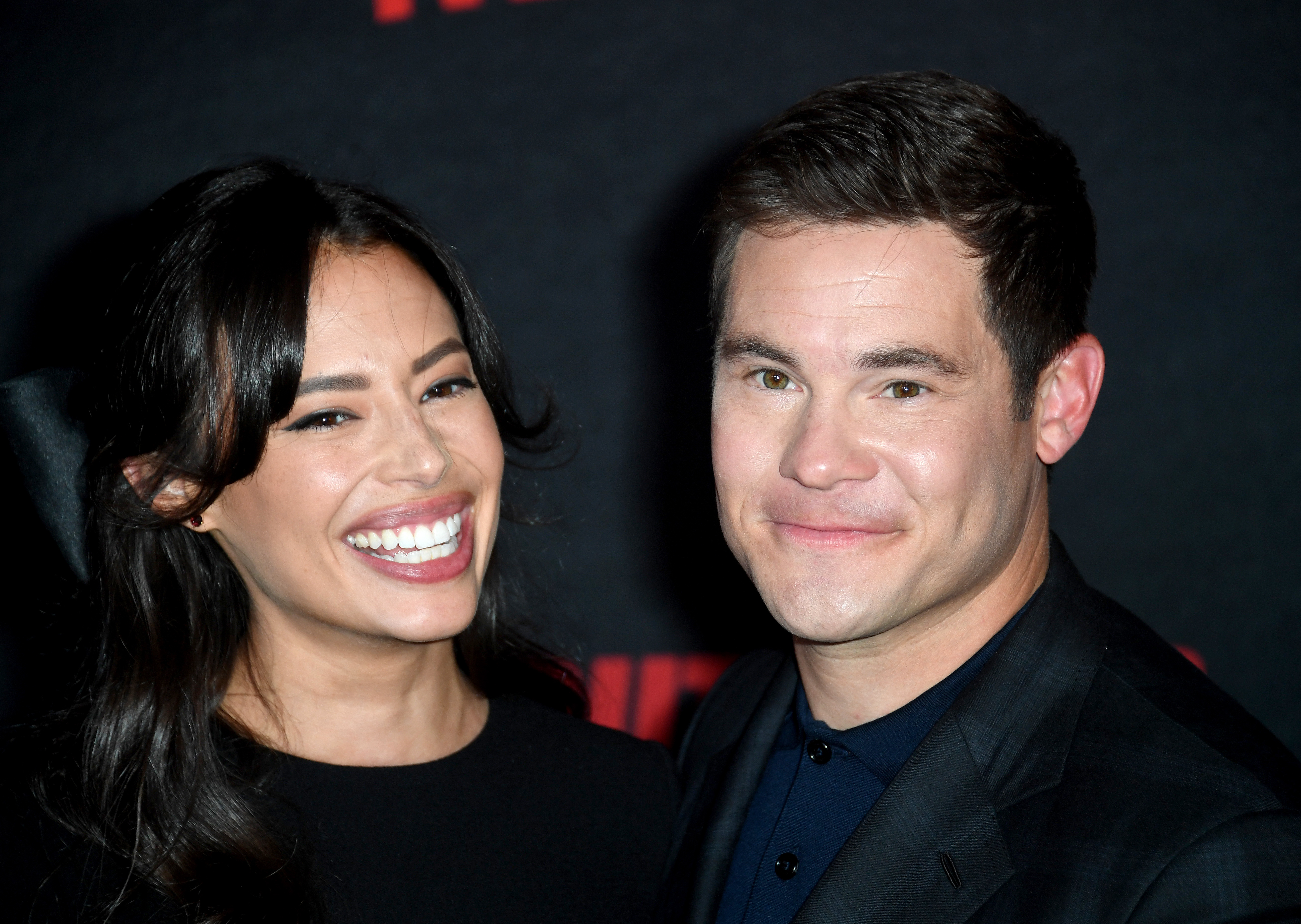 Chloe Bridges and Adam Devine at the premiere of "The Out-Laws" on June 26, 2023, in Los Angeles, California. | Source: Getty Images