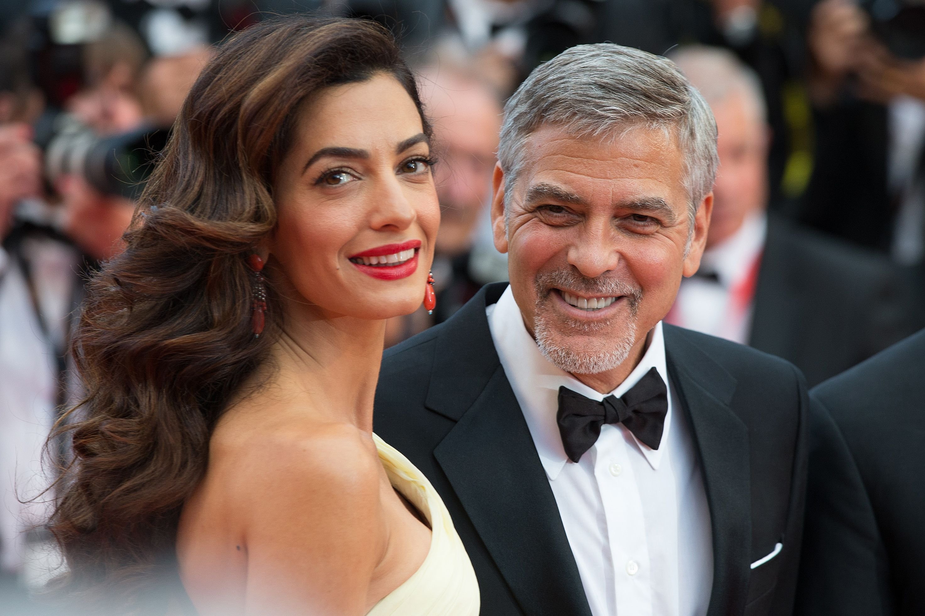 George and Amal Clooney at the Cannes Film Festival in 2016 for the screening of "Money Monster” | Source: Shutterstock