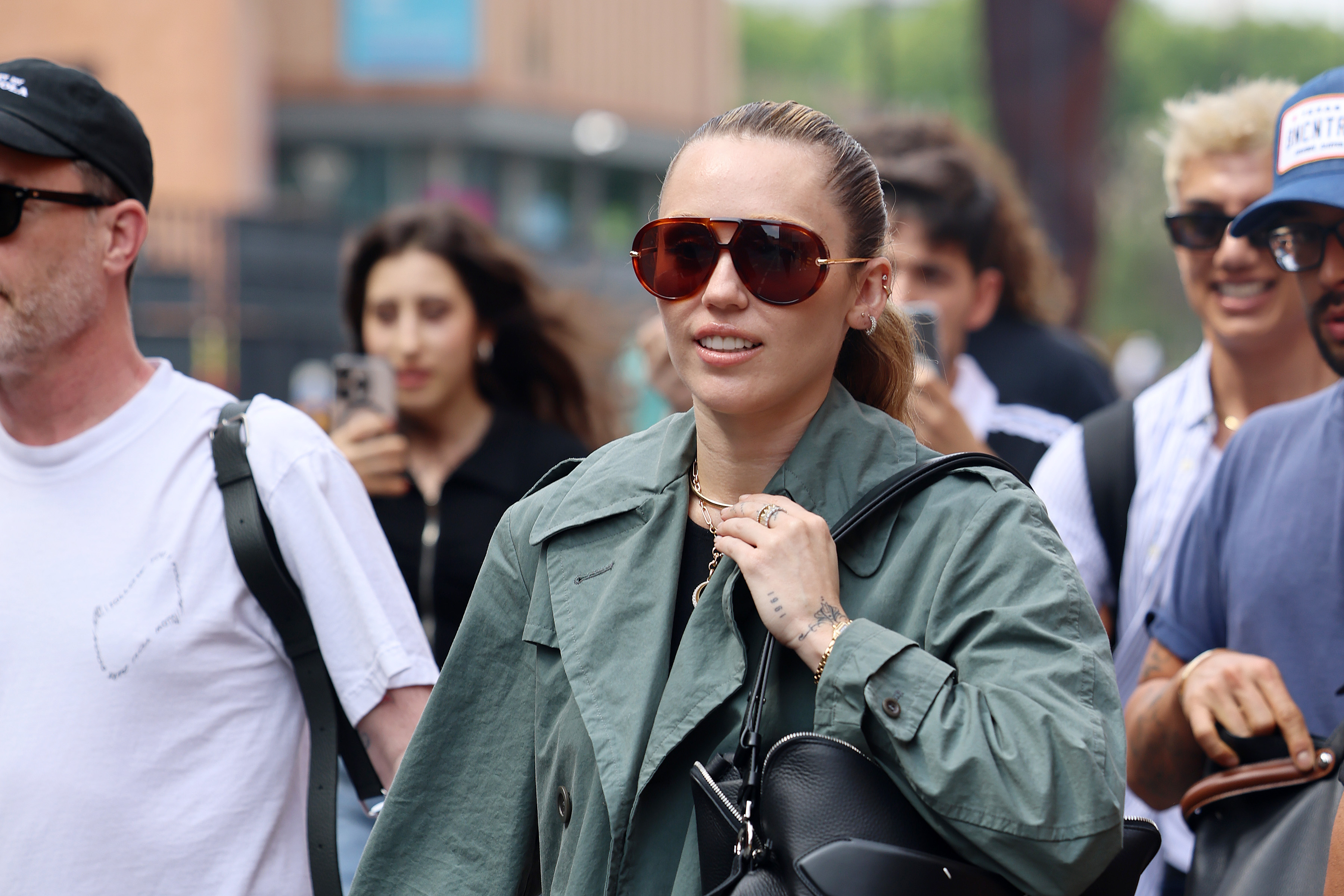 Miley Cyrus arrives at St Pancras International Eurostar from Paris in London, England on June 20, 2025 | Source: Getty Images