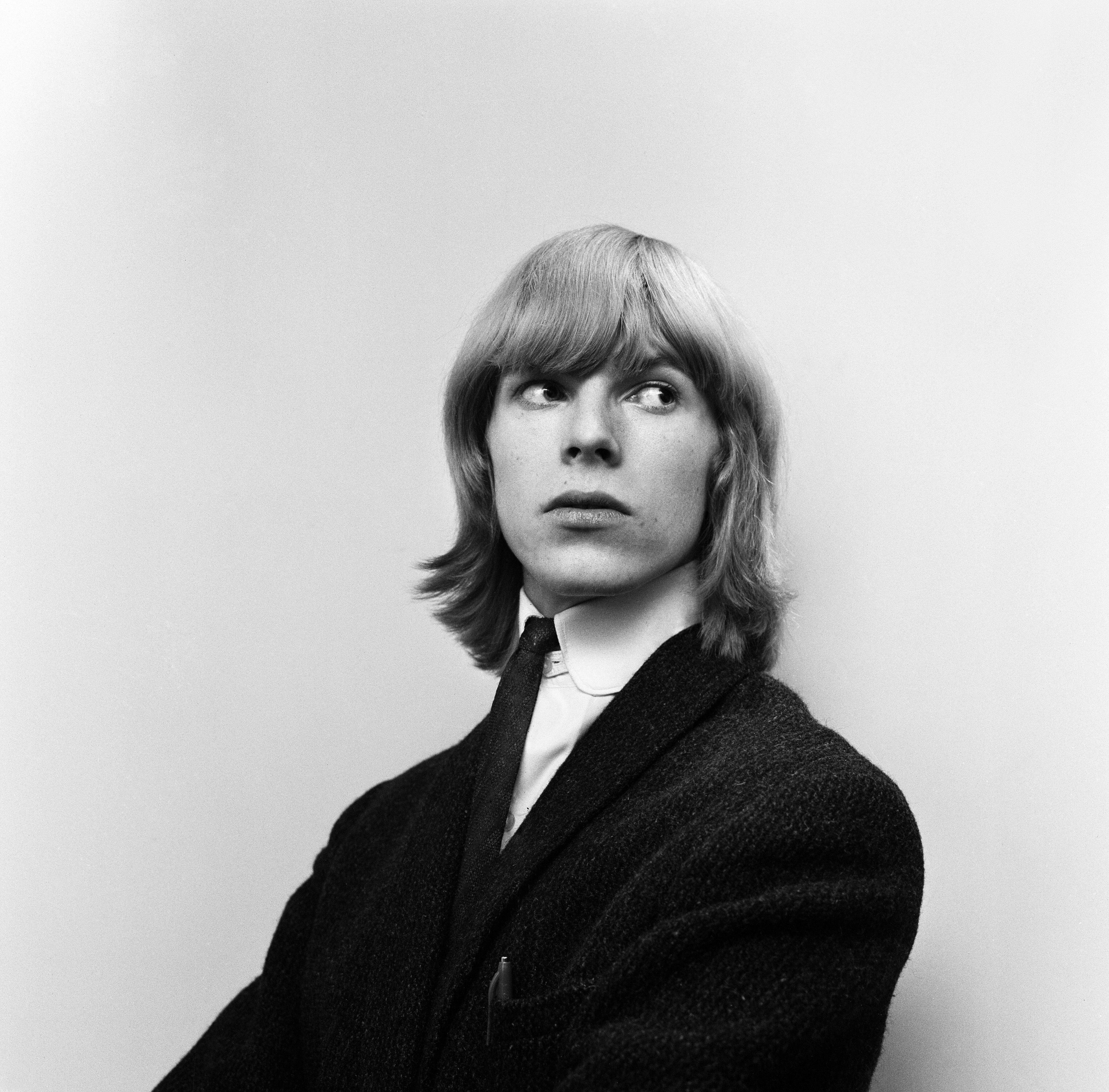 David Bowie pictured outside the BBC Television Centre waiting to speak to Barry Langford, producer of the show 'Gad Zooks Its All happening' on March 5, 1965 | Source: Getty Images