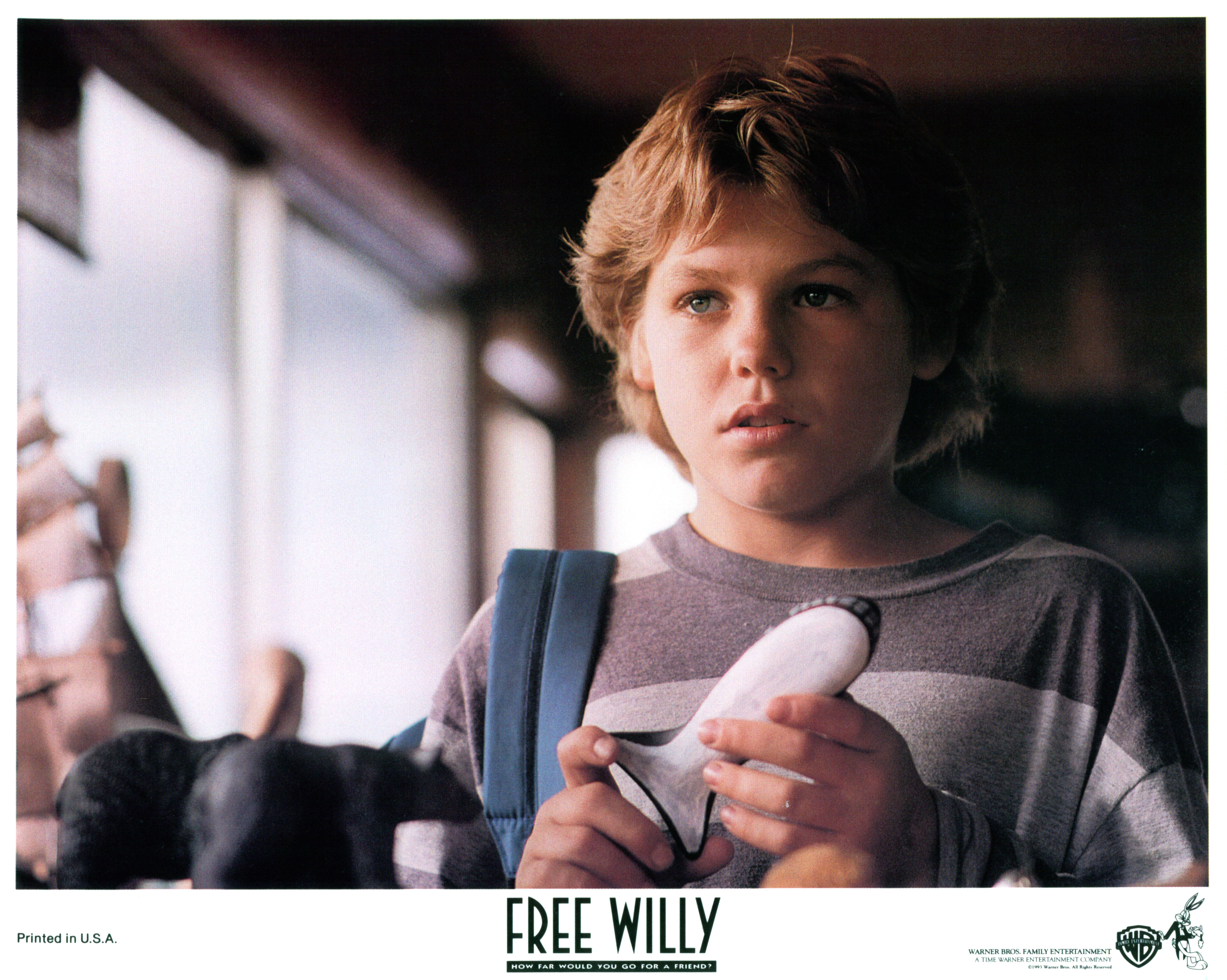 Jason James Richter holding whale piece in a scene from the film "Free Willy" in 1993. | Source: Getty Images
