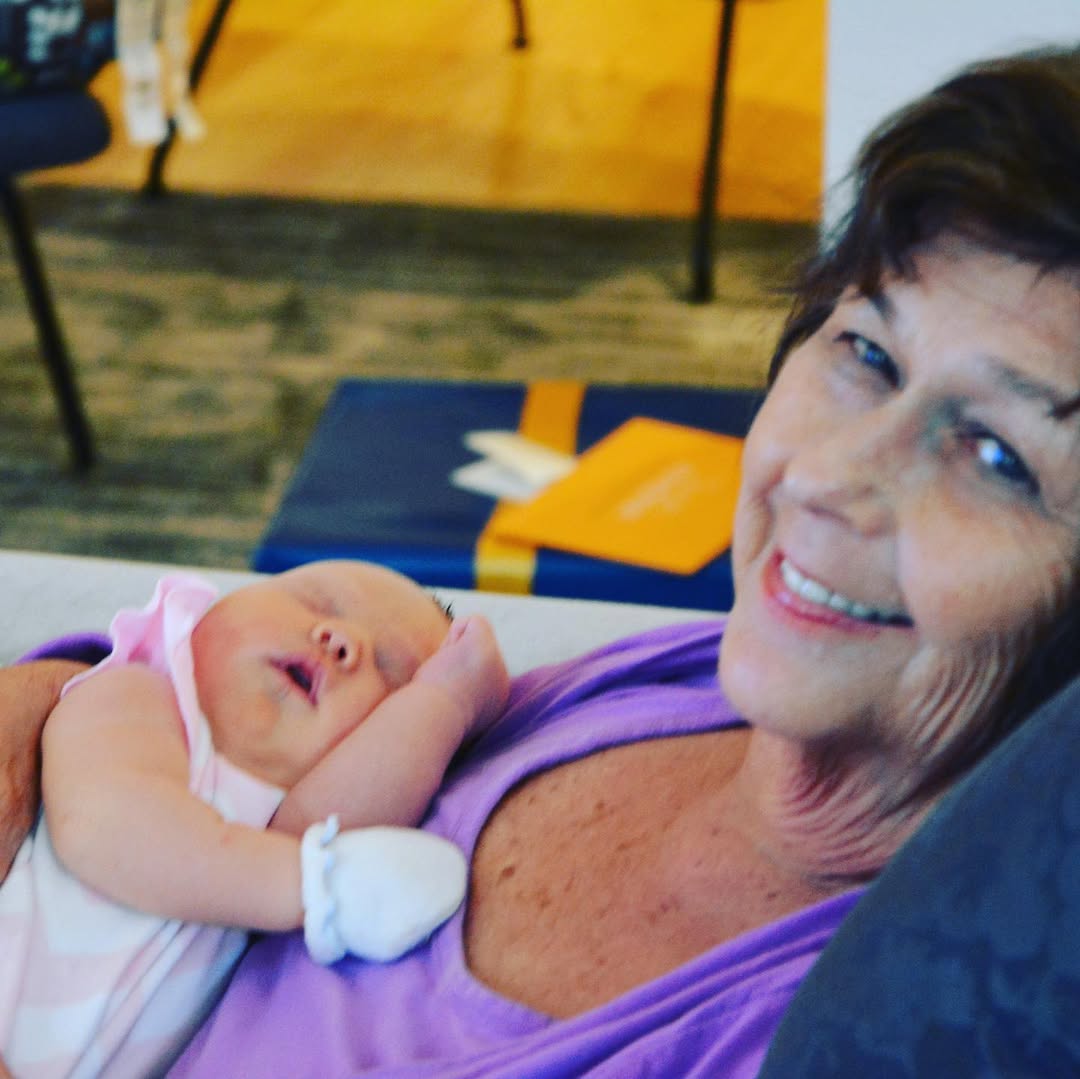 Nancy Guthrie holds her grandchild | Source: Instagram/savannahguthrie