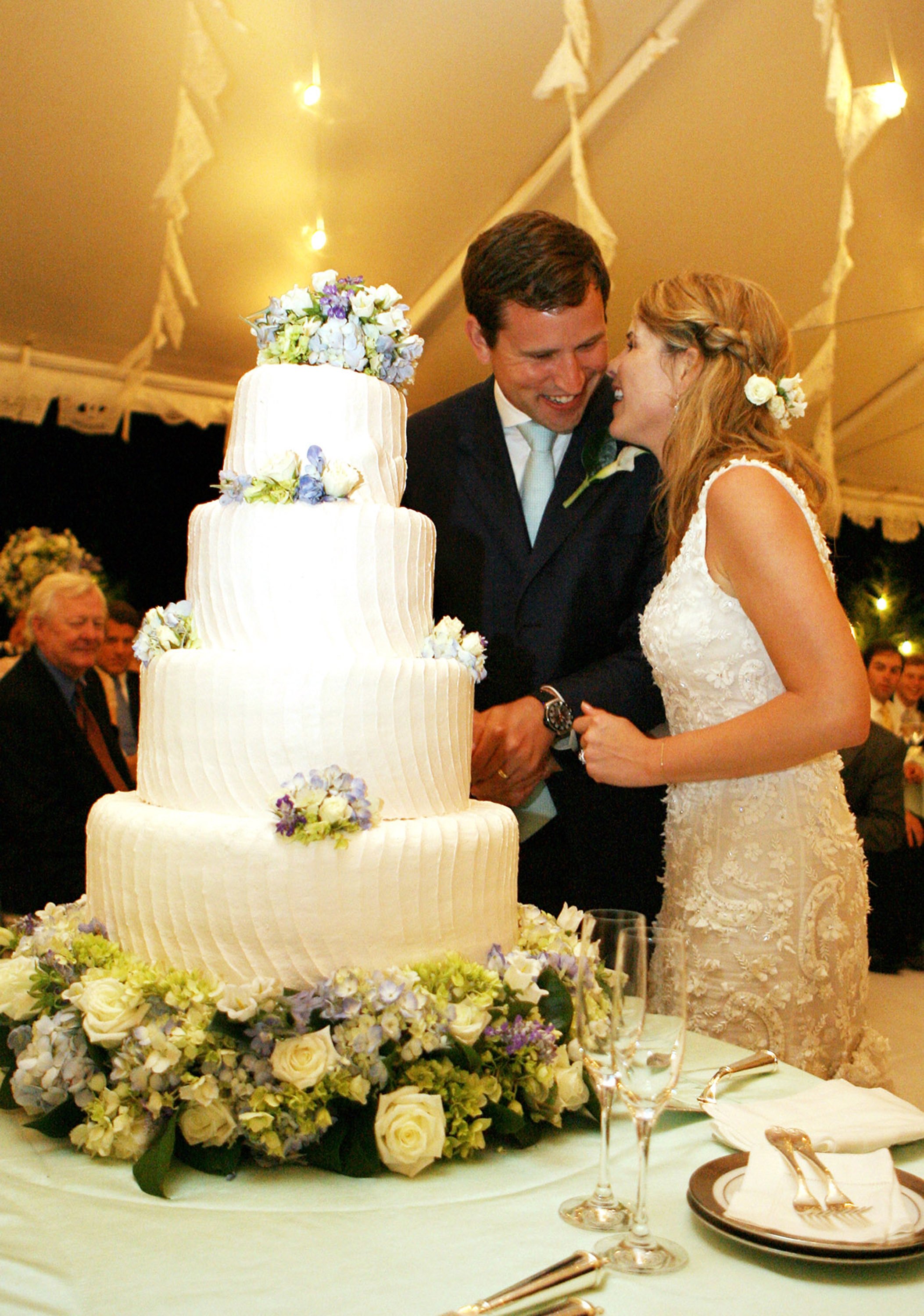 Henry and Jenna Hager cut their wedding cake during a reception in their honor following the ceremony at Prairie Chapel Ranch May 10, 2008 near Crawford, Texas | Source: Getty Images