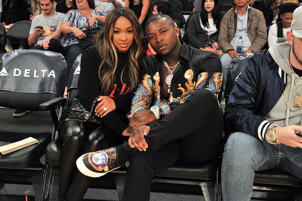 Actress Malika Haqq and rapper O.T. Genasis attend a basketball game between the Los Angeles Lakers and the Chicago Bulls at Staples Center on November 21, 2017 in Los Angeles, California. I Image: Getty Images.