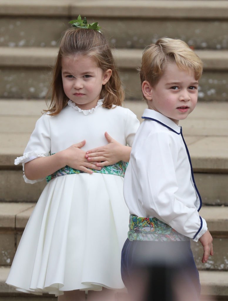 Princess Charlotte of Cambridge and Prince George of Cambridge ahead of the wedding of Princess Eugenie of York and Mr. Jack Brooksbank at St. George's Chapel | Photo: Getty Images