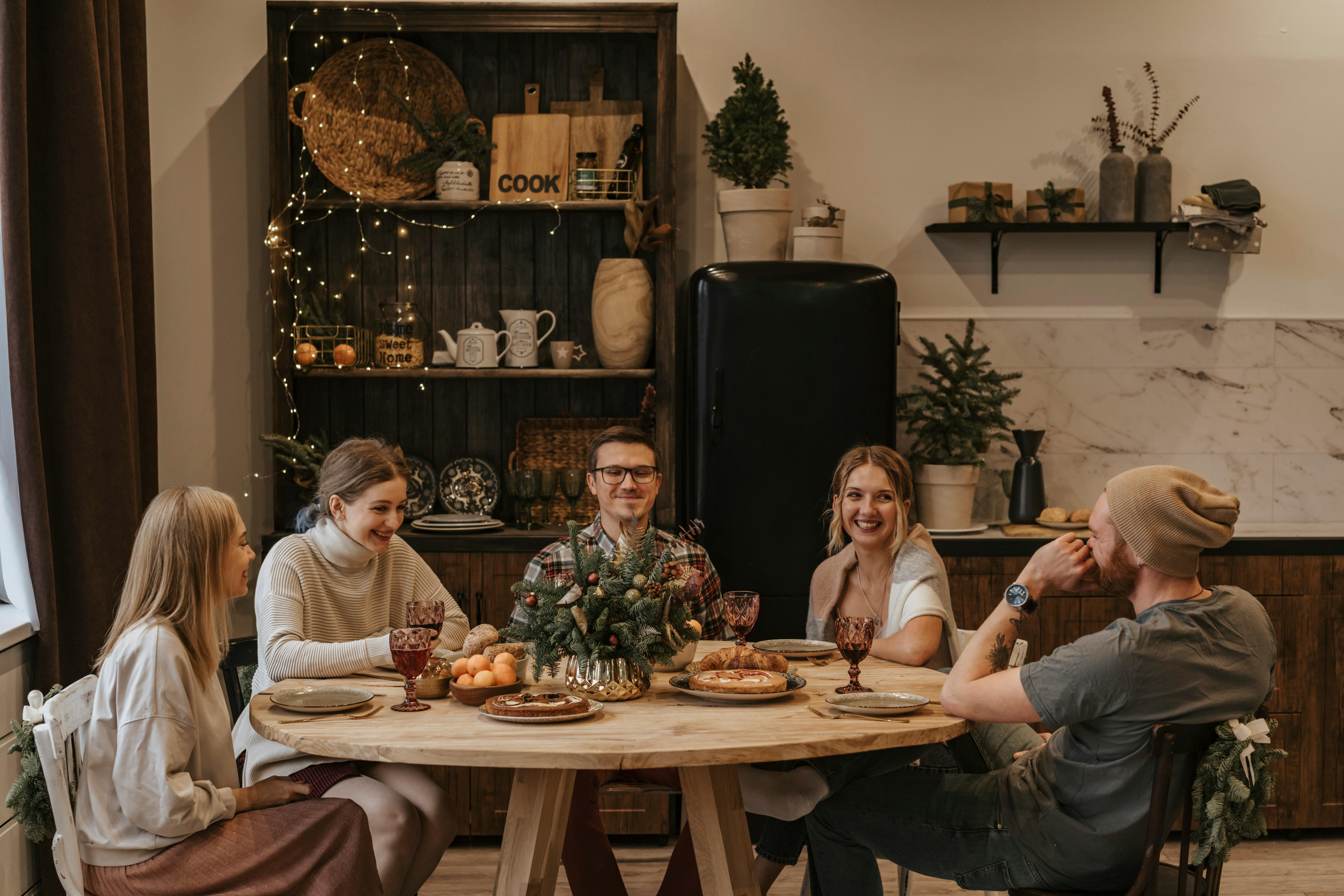 A family around a table | Source: Pexels